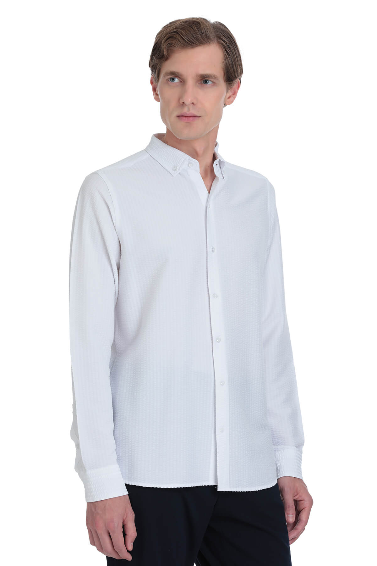 White long-sleeved button-down shirt with a classic collar and neatly pressed fabric.