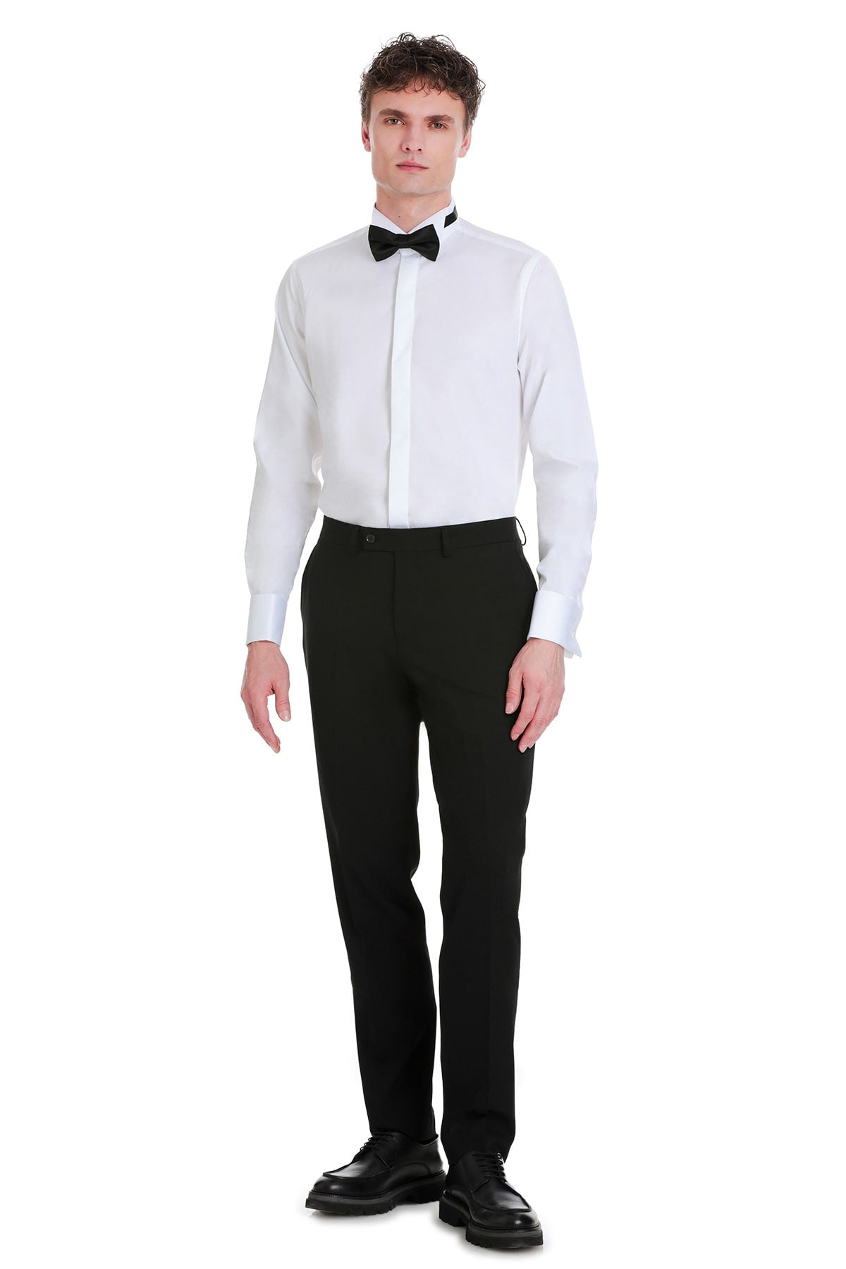 Comfort fit white sateen tuxedo shirt with classic pointed collar and french cuffs paired with black trousers
