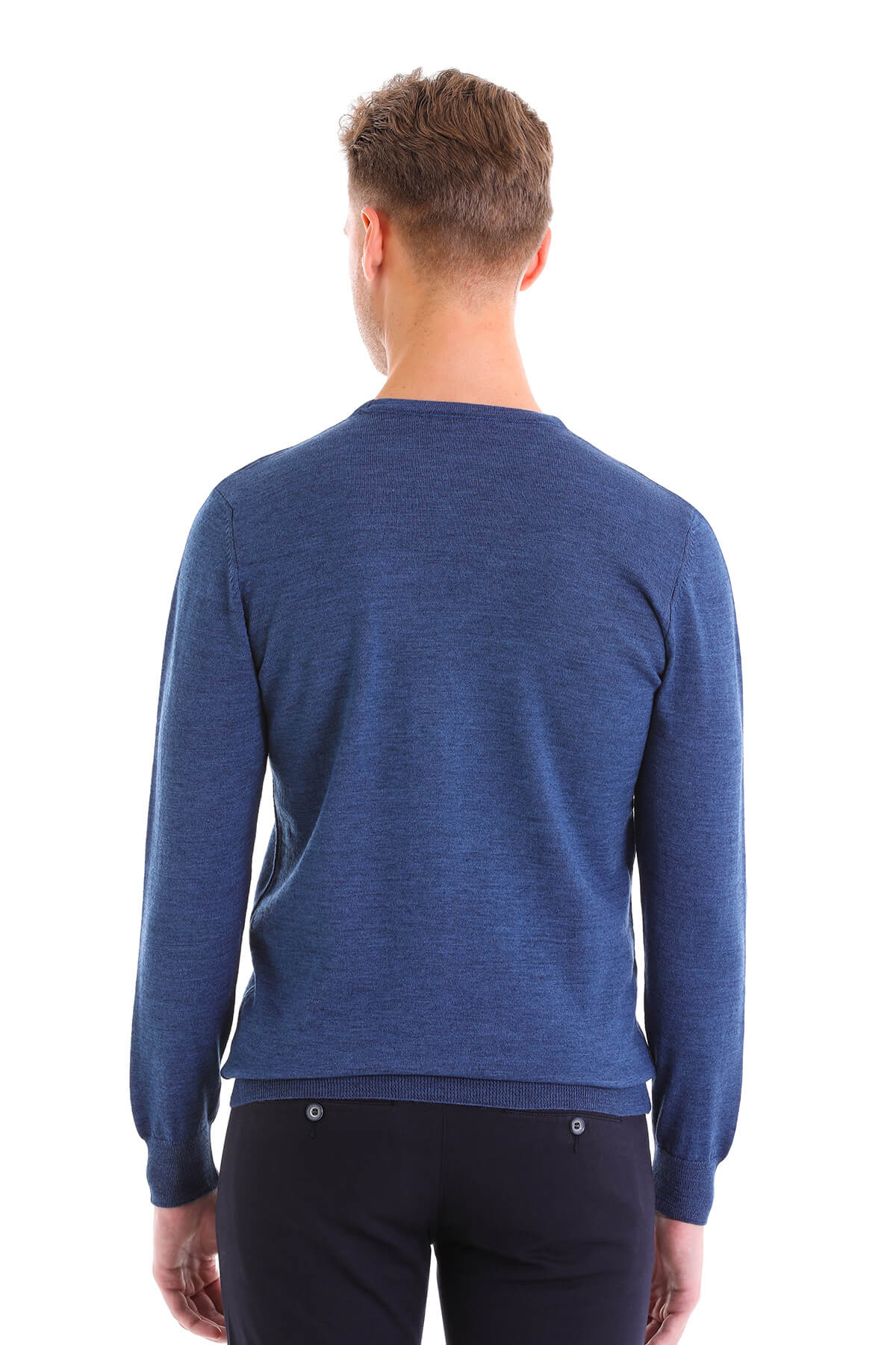 A navy blue, long-sleeved knit sweater with a subtle textured pattern and ribbed cuffs.