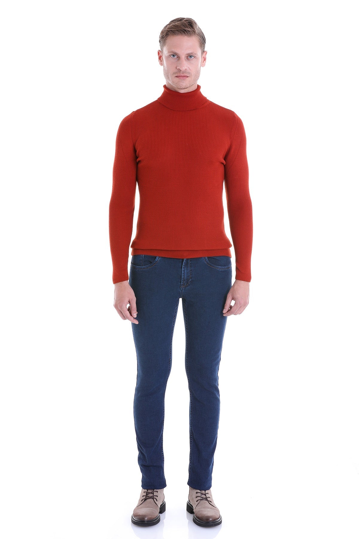 A man wearing a ribbed, long-sleeved red turtleneck sweater.