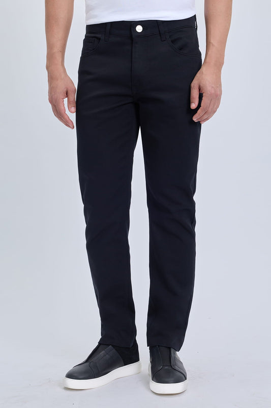 Dynamic fit black cotton gabardine casual pants featuring slim-fit black jeans with classic five-pocket design and white button closure for smart casual dress