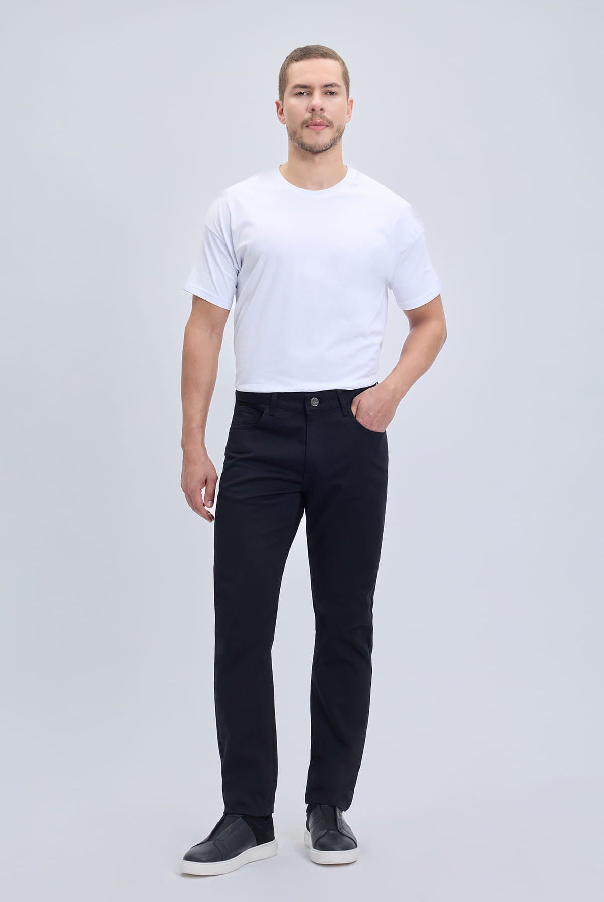 Dynamic fit black cotton gabardine casual pants in slim-fit denim with five-pocket design for smart casual dress