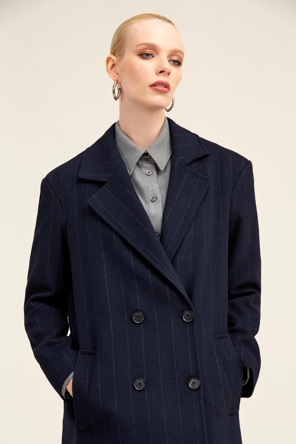 Navy blue pinstripe double-breasted coat