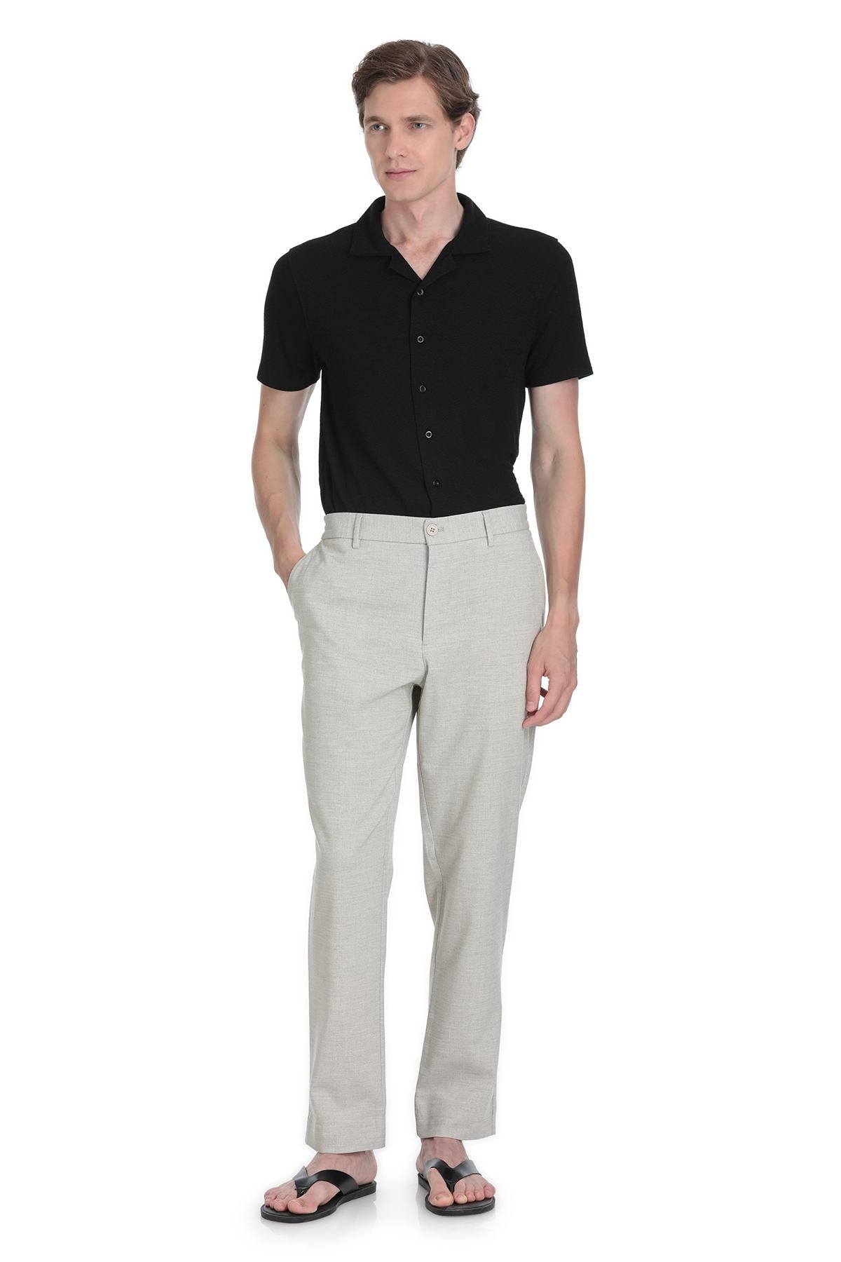 A pair of dynamic fit gray slim-fit jogger pants in light gray linen blend with a clean tailored cut and belt loops