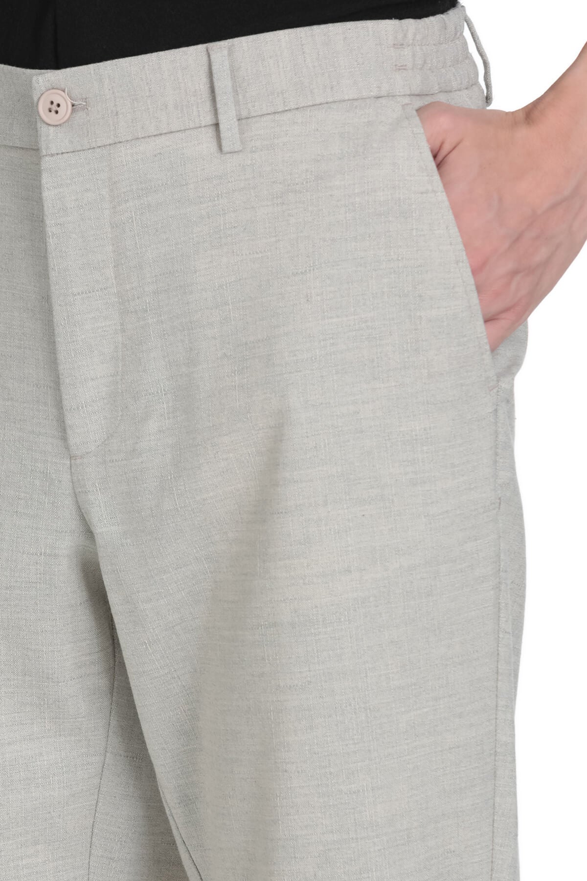 Dynamic fit gray linen blend jogger pants in light gray with textured woven pattern and matching button closure for smart casual wear