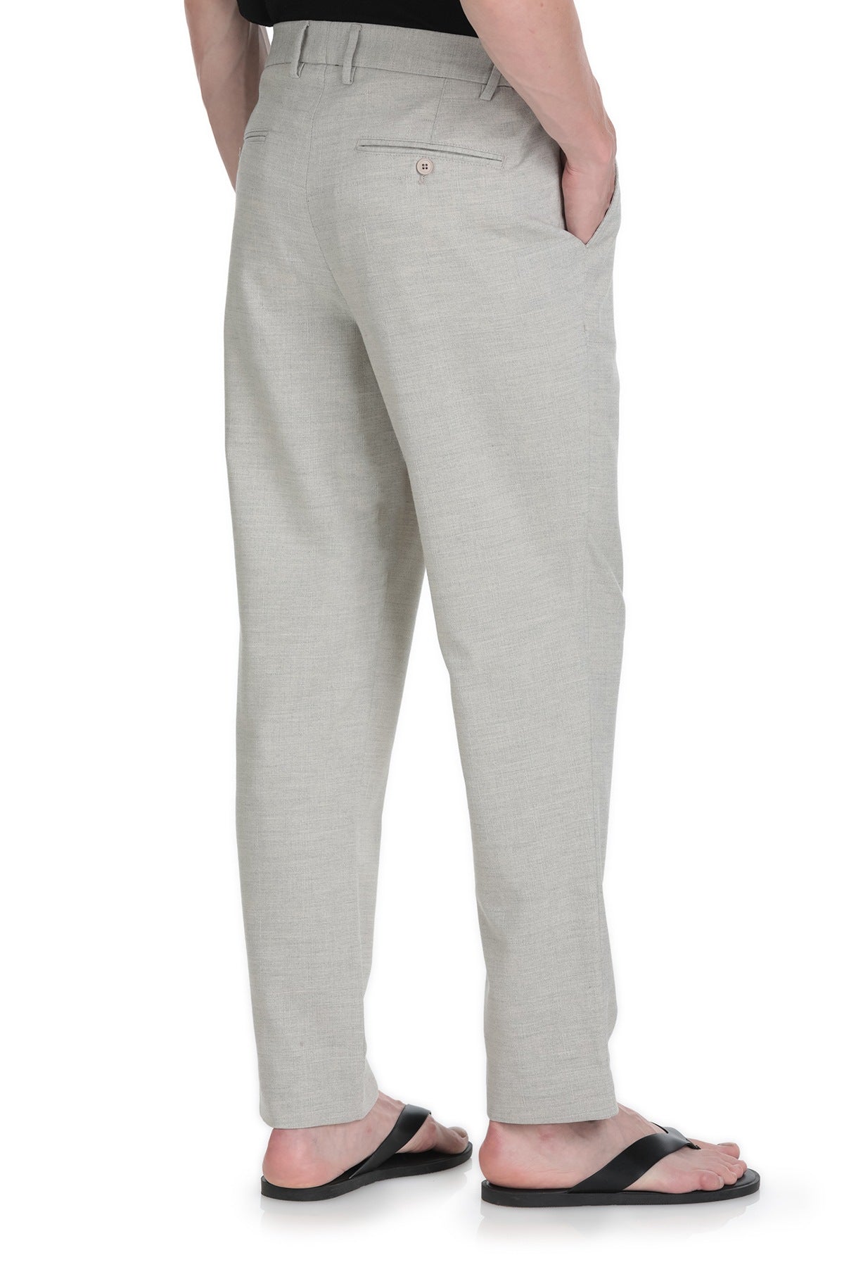 Back view of dynamic fit gray linen blend jogger pants featuring light gray chino trousers with textured weave and single button closure