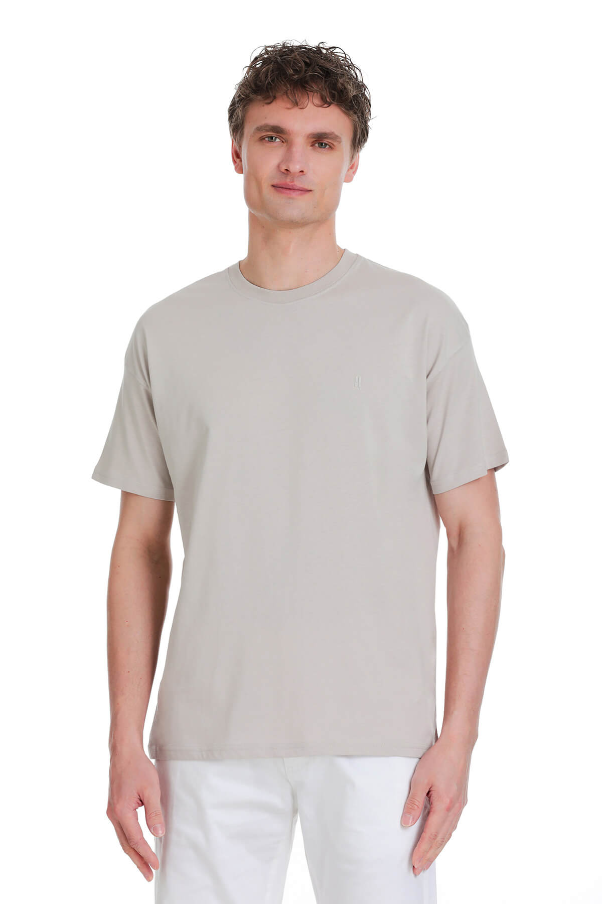 Ecru oversize crew neck t-shirt made of soft light gray cotton fabric with a simple design