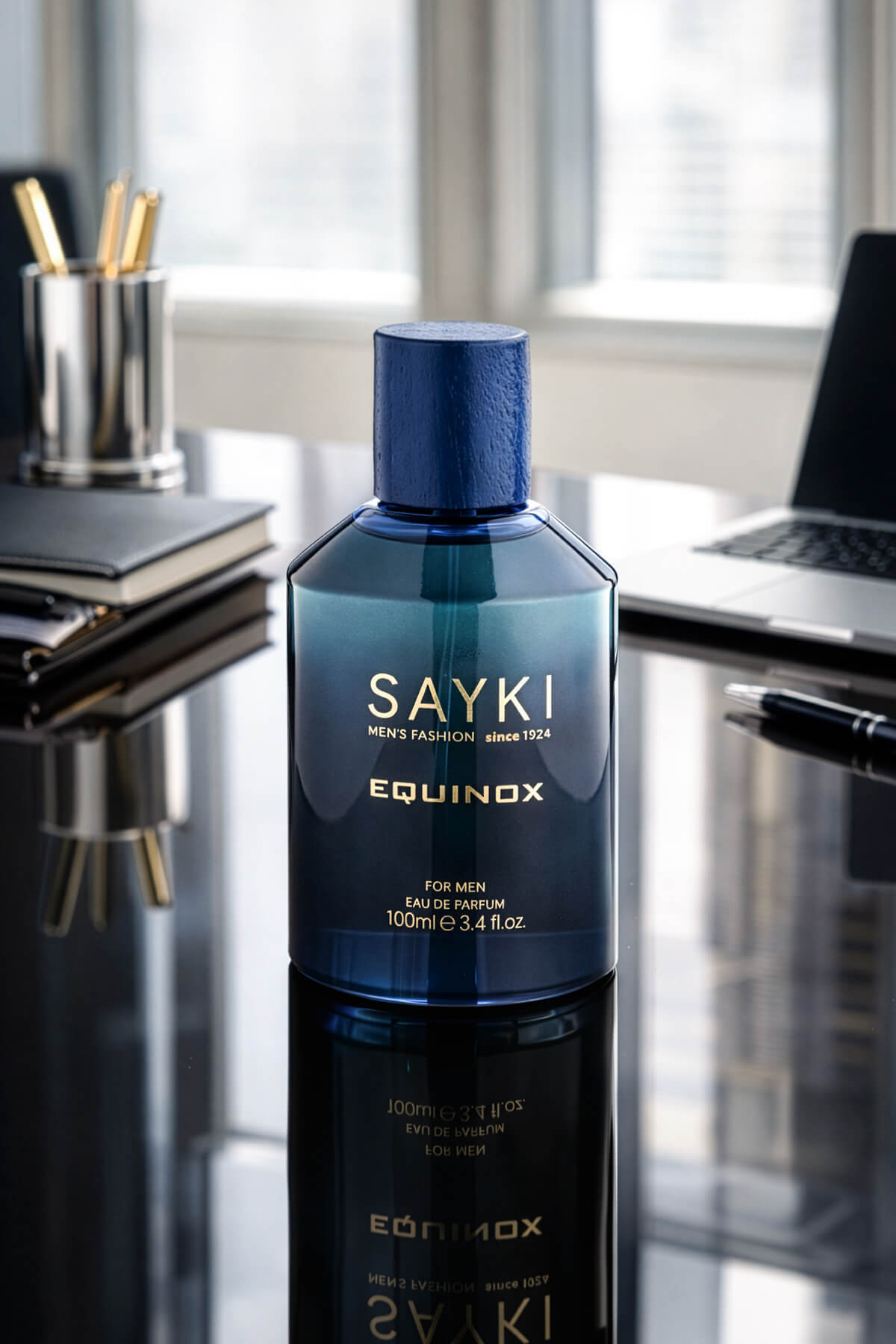 A sleek deep blue glass bottle of sayki equinox men’s eau de parfum 100 ml for men