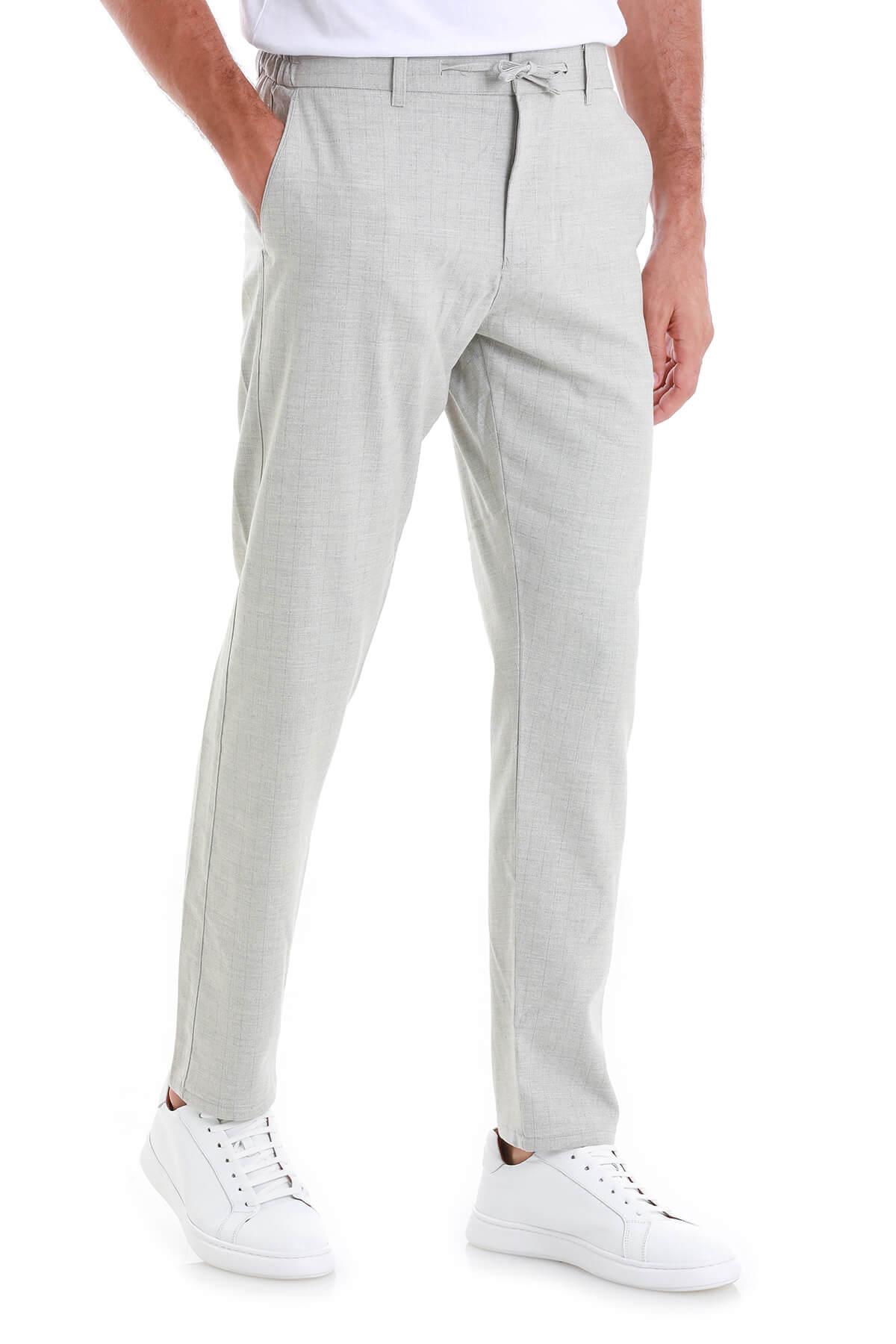 Light gray chino trousers with a drawstring waistband.