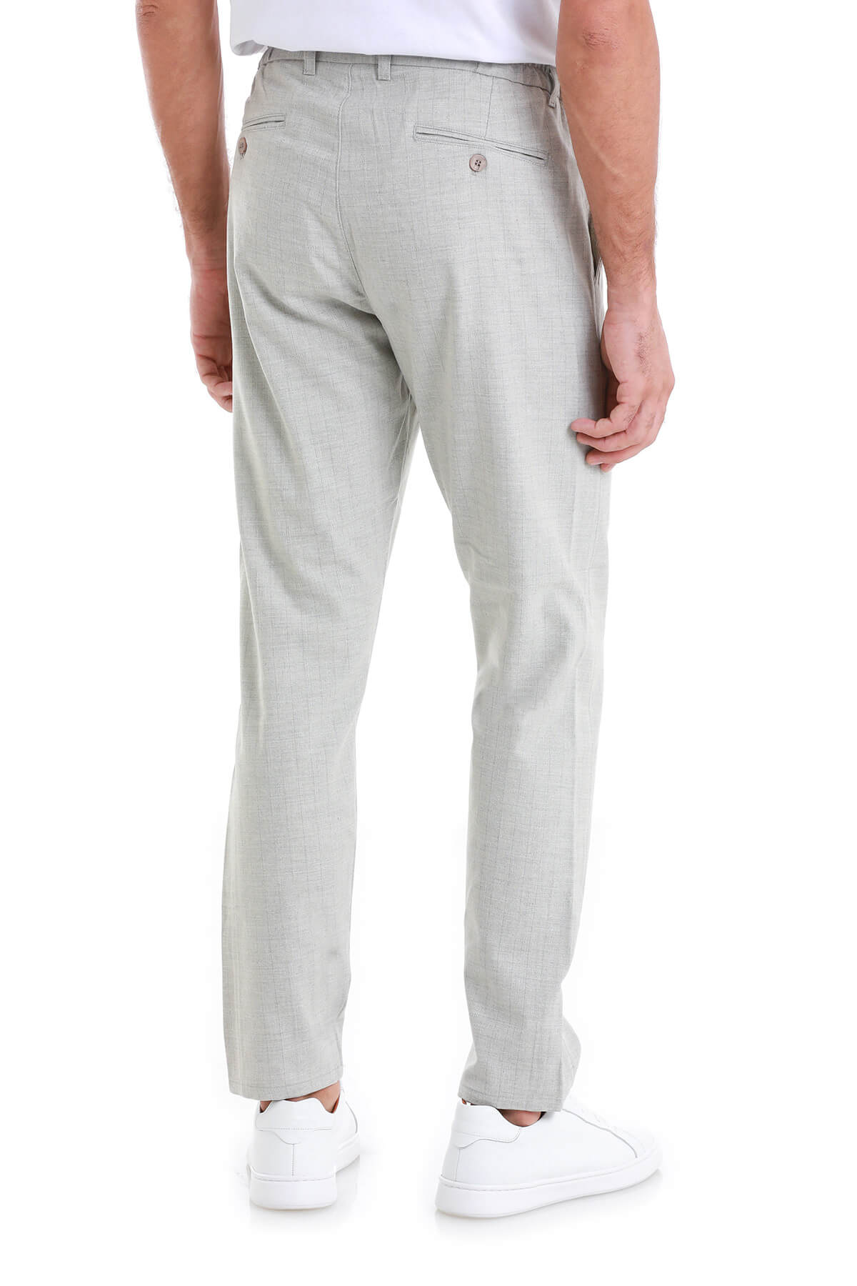 Light gray chino trousers with a subtle textured weave and two back pockets featuring buttoned flaps.