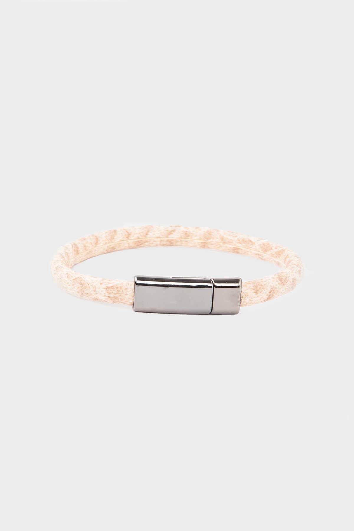 Cream-colored braided leather bracelet with a sleek silver magnetic clasp.