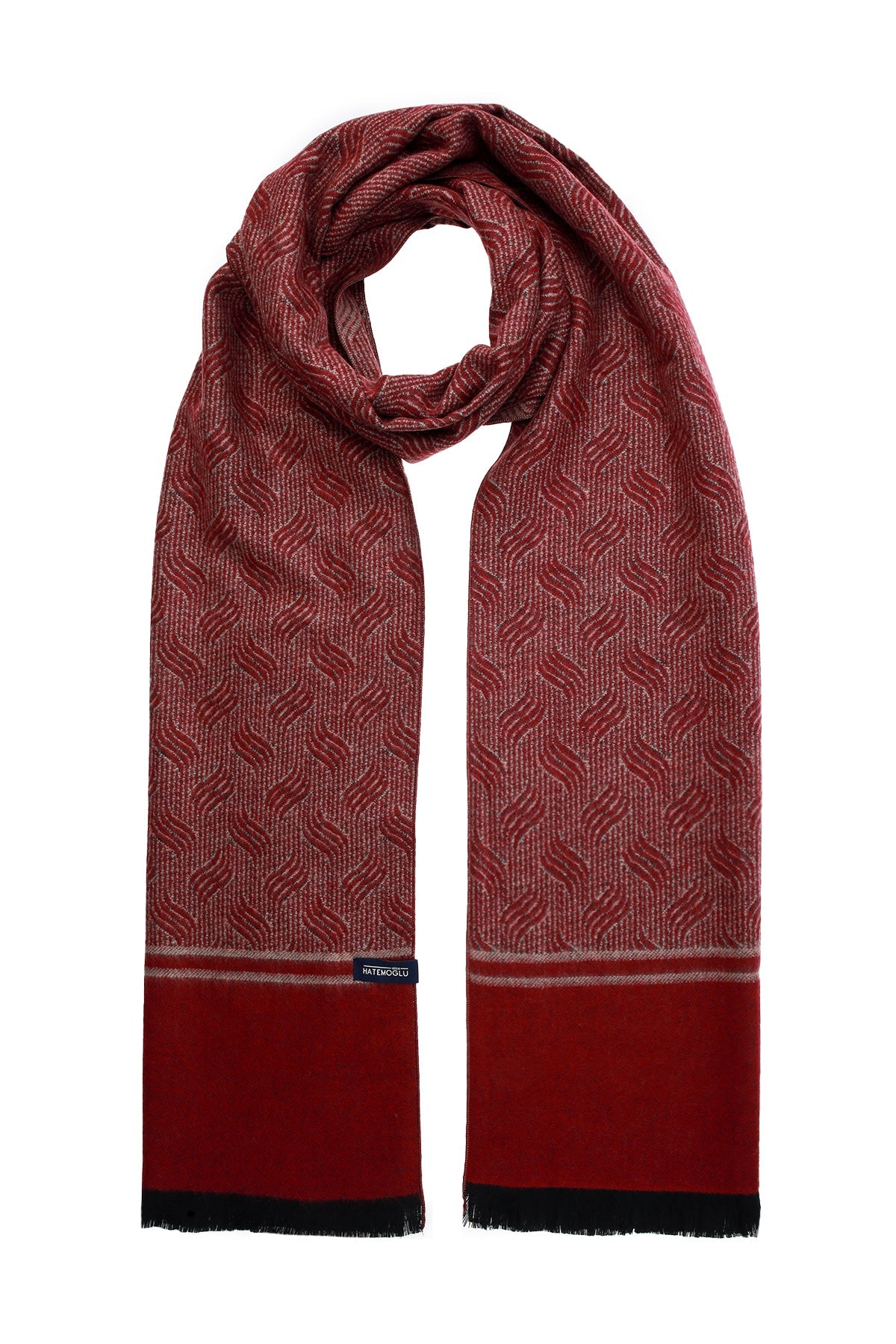 A rich burgundy scarf with a subtle woven geometric pattern and solid red bands at the ends, featuring black frayed edges.