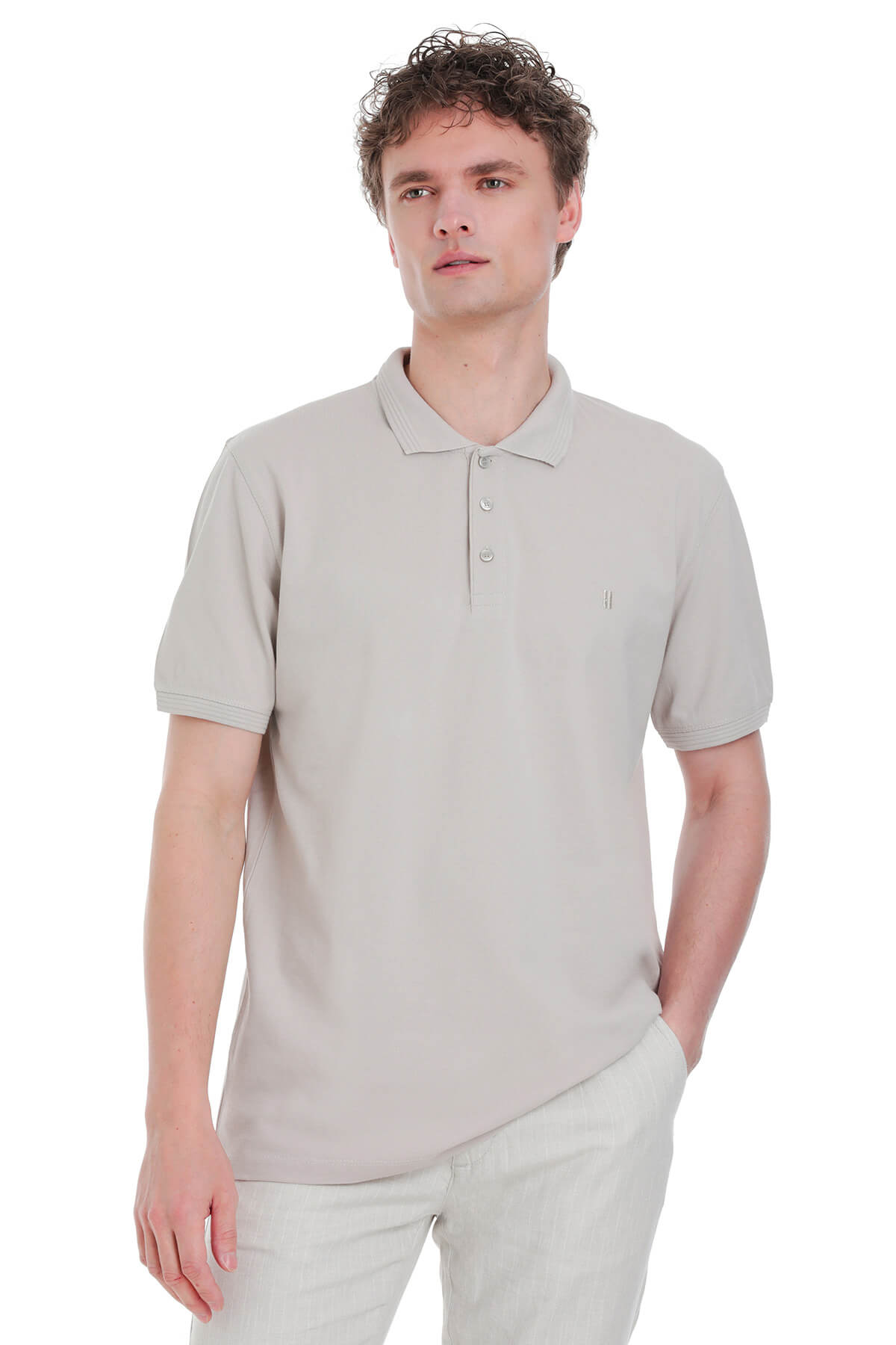 A light gray, short-sleeved polo shirt with a classic collar and subtle button placket.