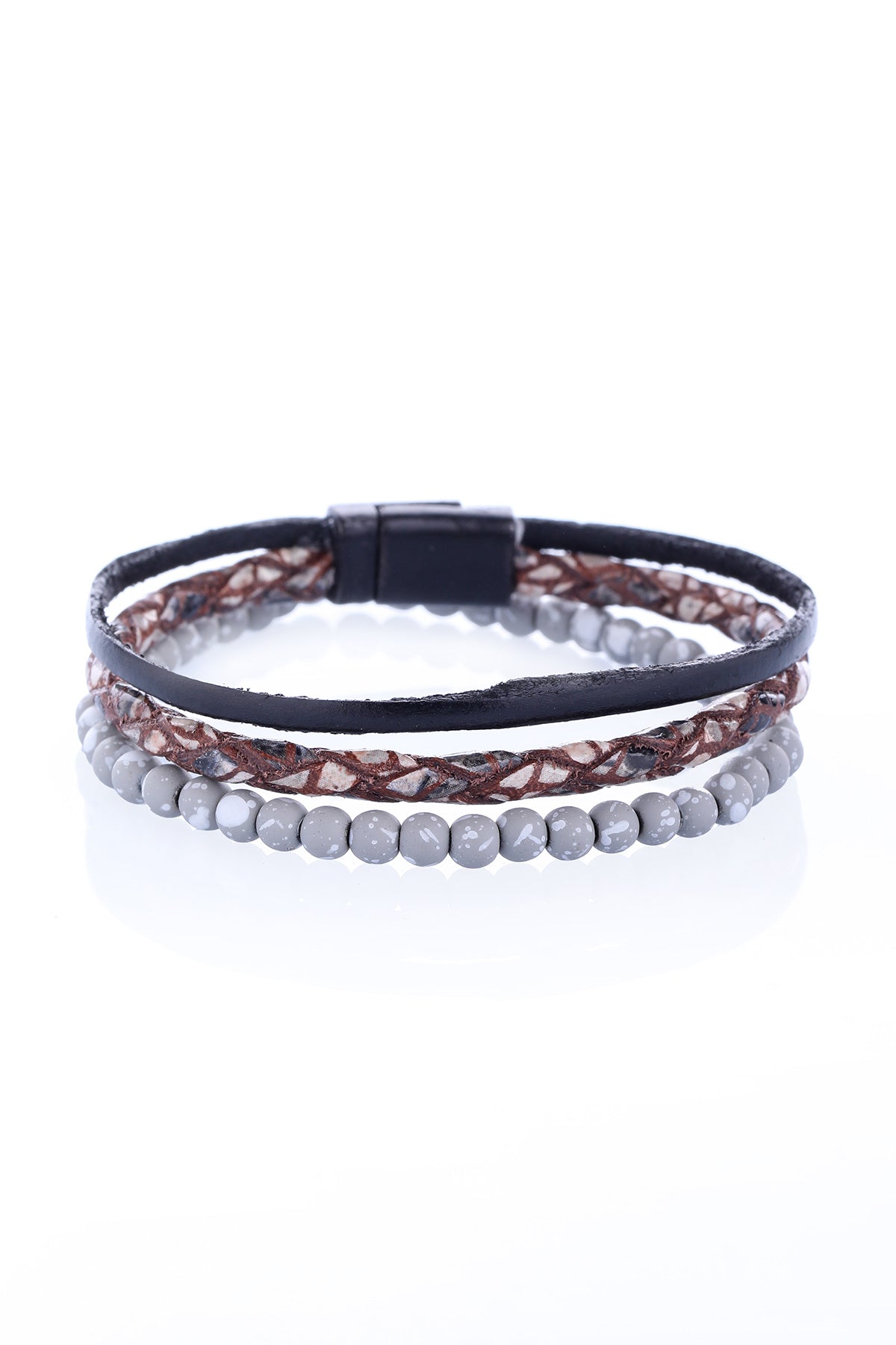 A layered bracelet featuring a black leather band, a brown lace-patterned strap with metallic accents, and a row of gray faceted beads.