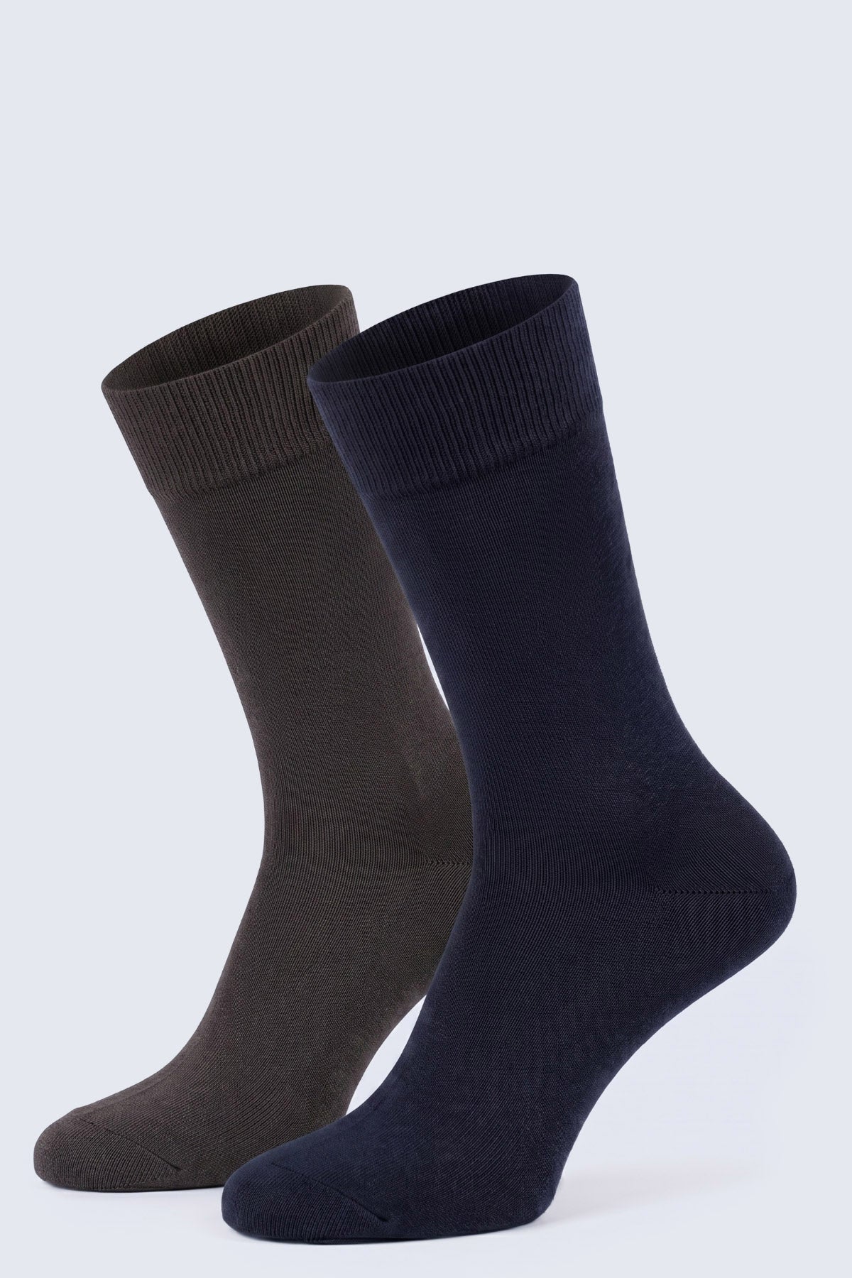 A pair of navy and brown crew socks made from soft knit brown socket bamboo fabric with ribbed cuffs socket bamboo socks