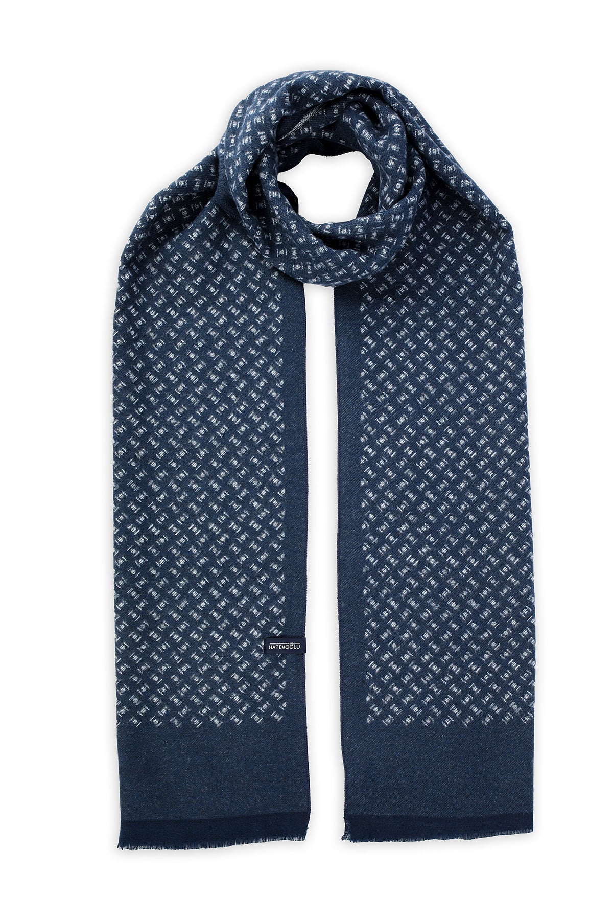 Dark blue scarf with a subtle white geometric pattern and frayed edges.