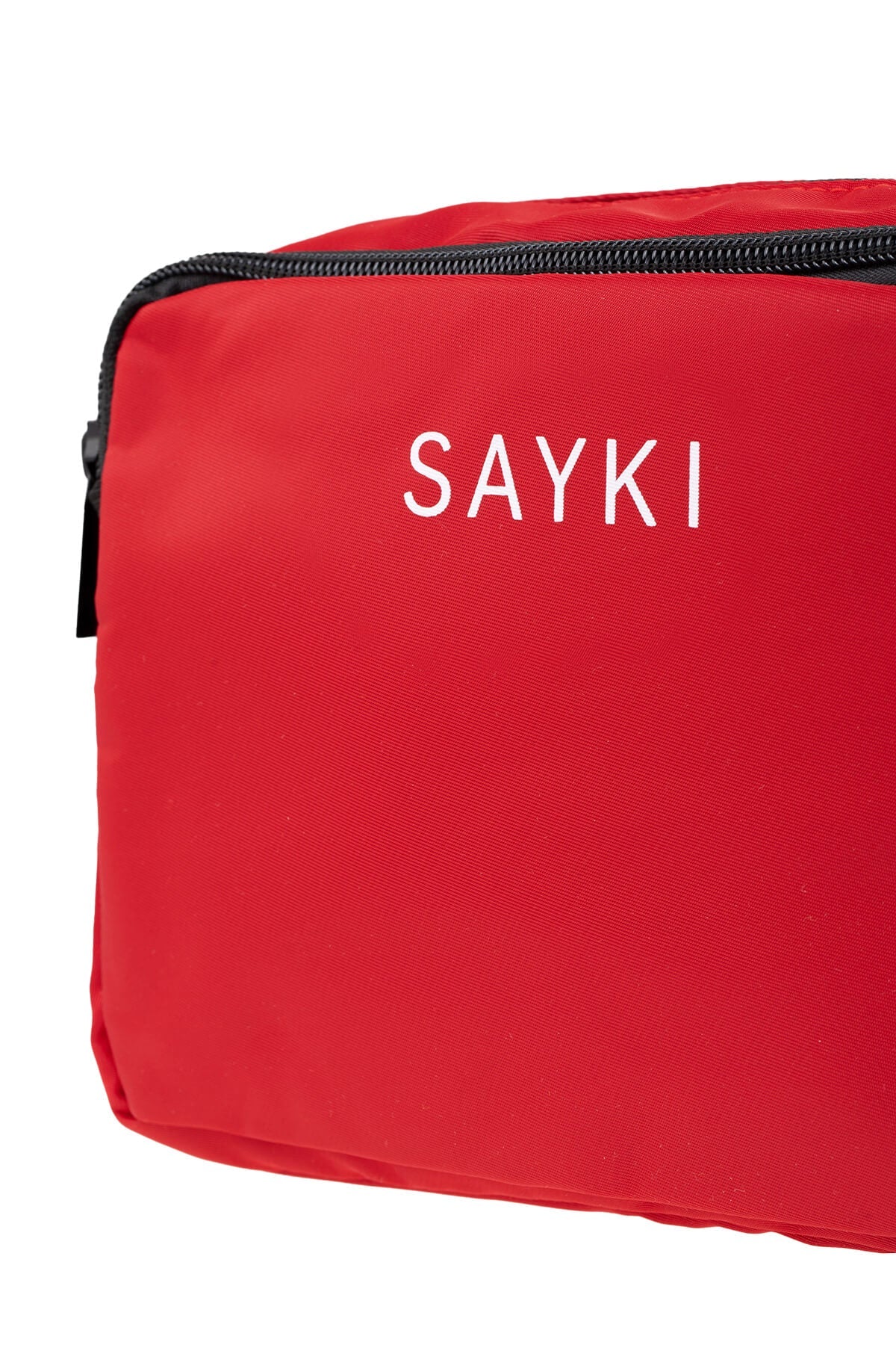 Red sayki brand travel bag with black zipper and white lettering.