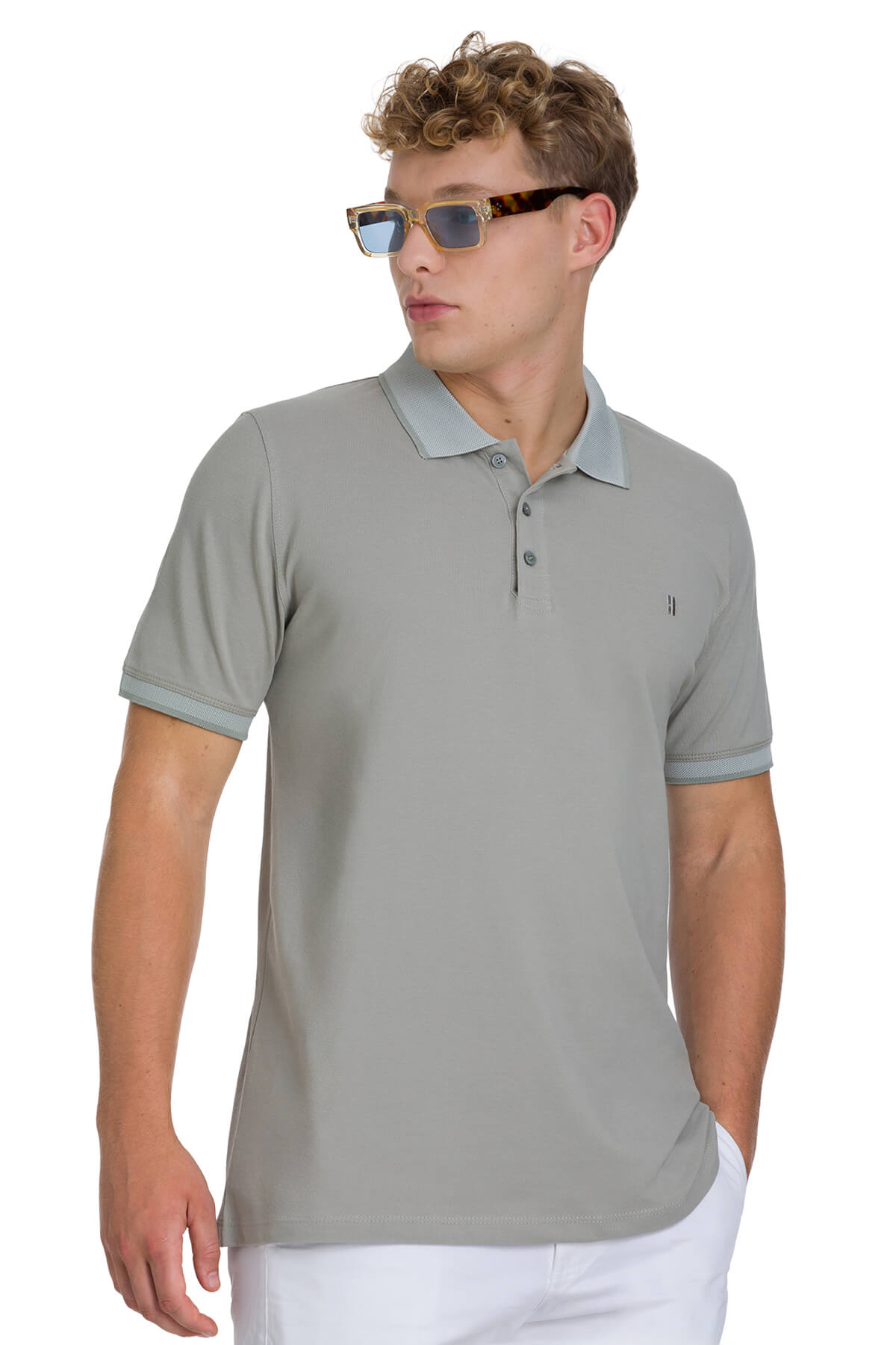 Regular fit cotton light khaki polo shirt with matching collar, sleeve cuffs, buttoned placket, and embroidered logo