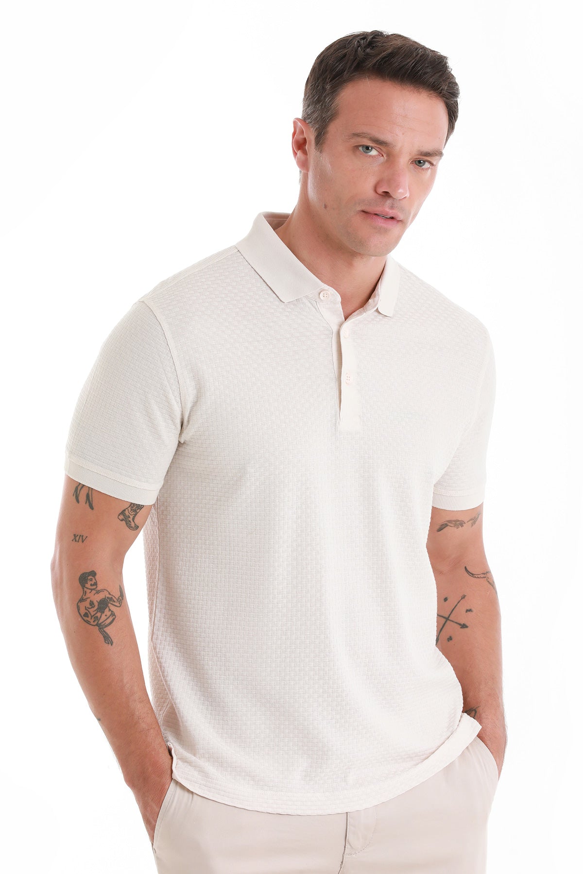 White textured cotton polo shirt with a classic collar and button placket.