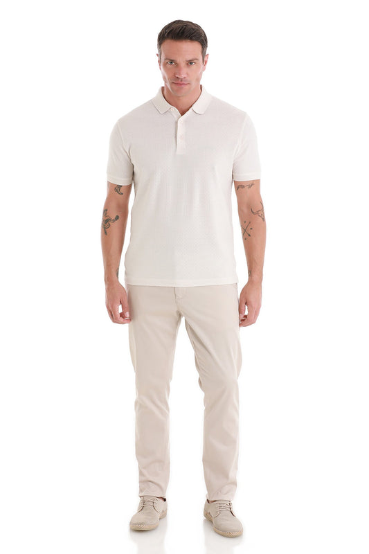 A crisp white short-sleeved polo shirt with a classic collar and buttoned placket.