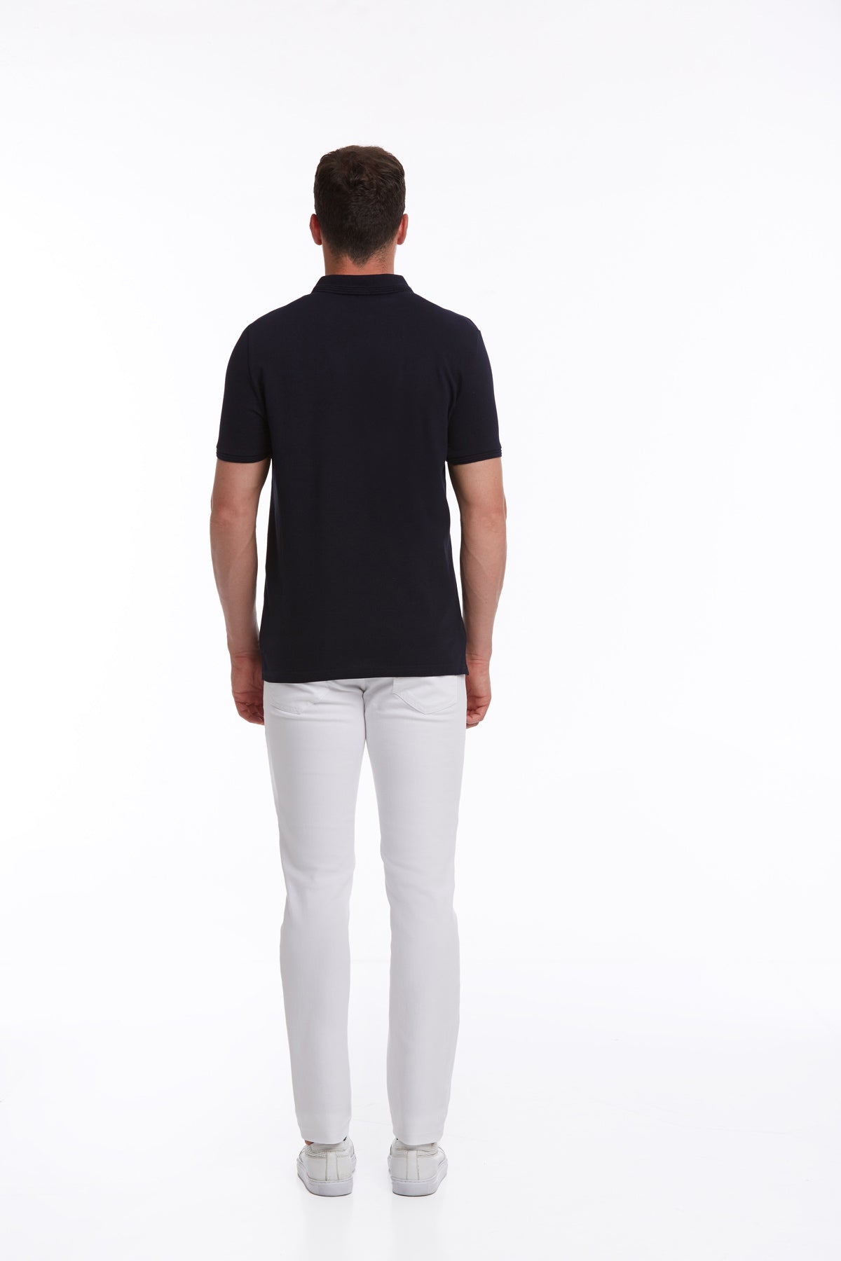 Black short-sleeved polo shirt with a classic collar and neatly tailored fit.