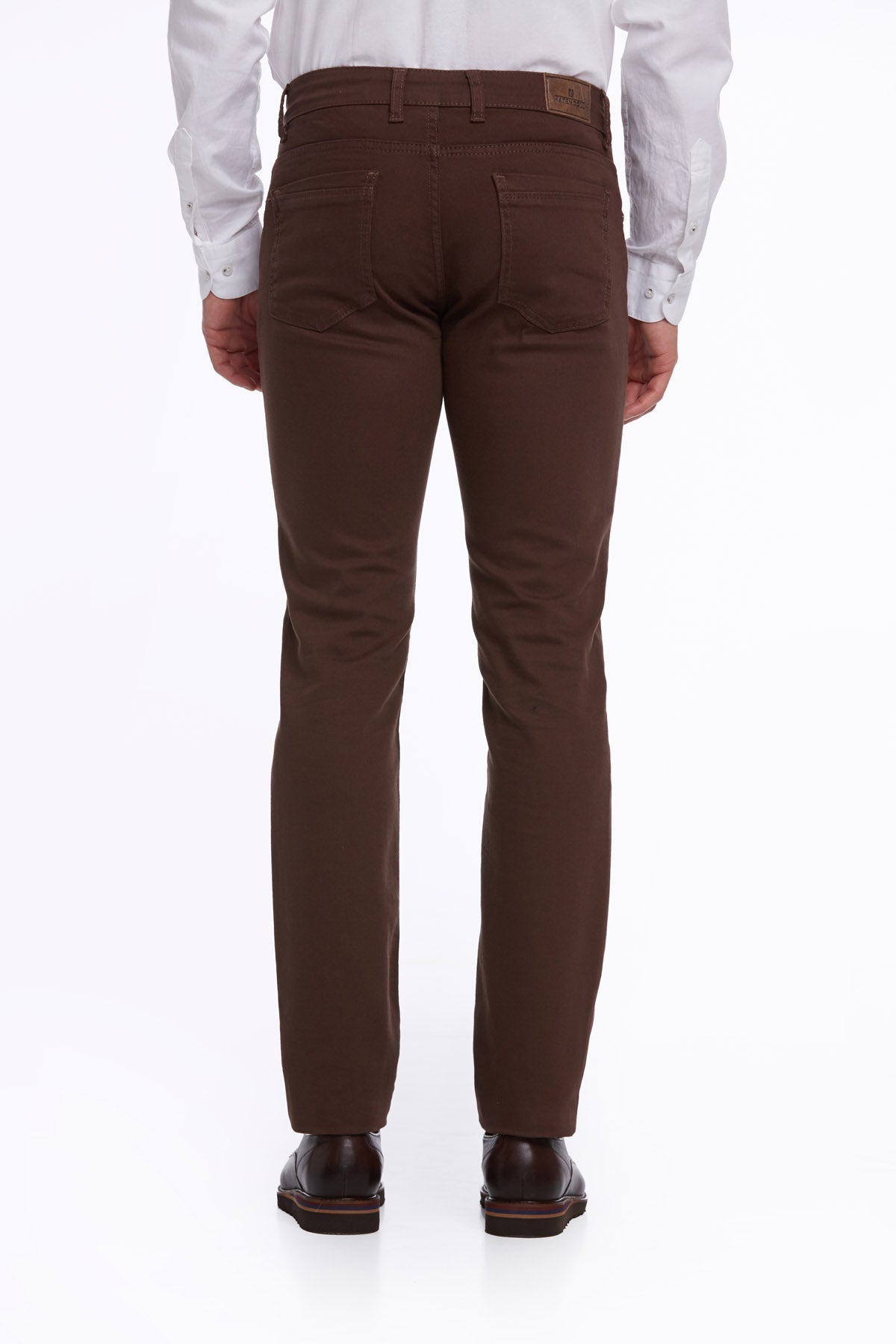 Brown chino pants with a classic fit and subtle stitching details.