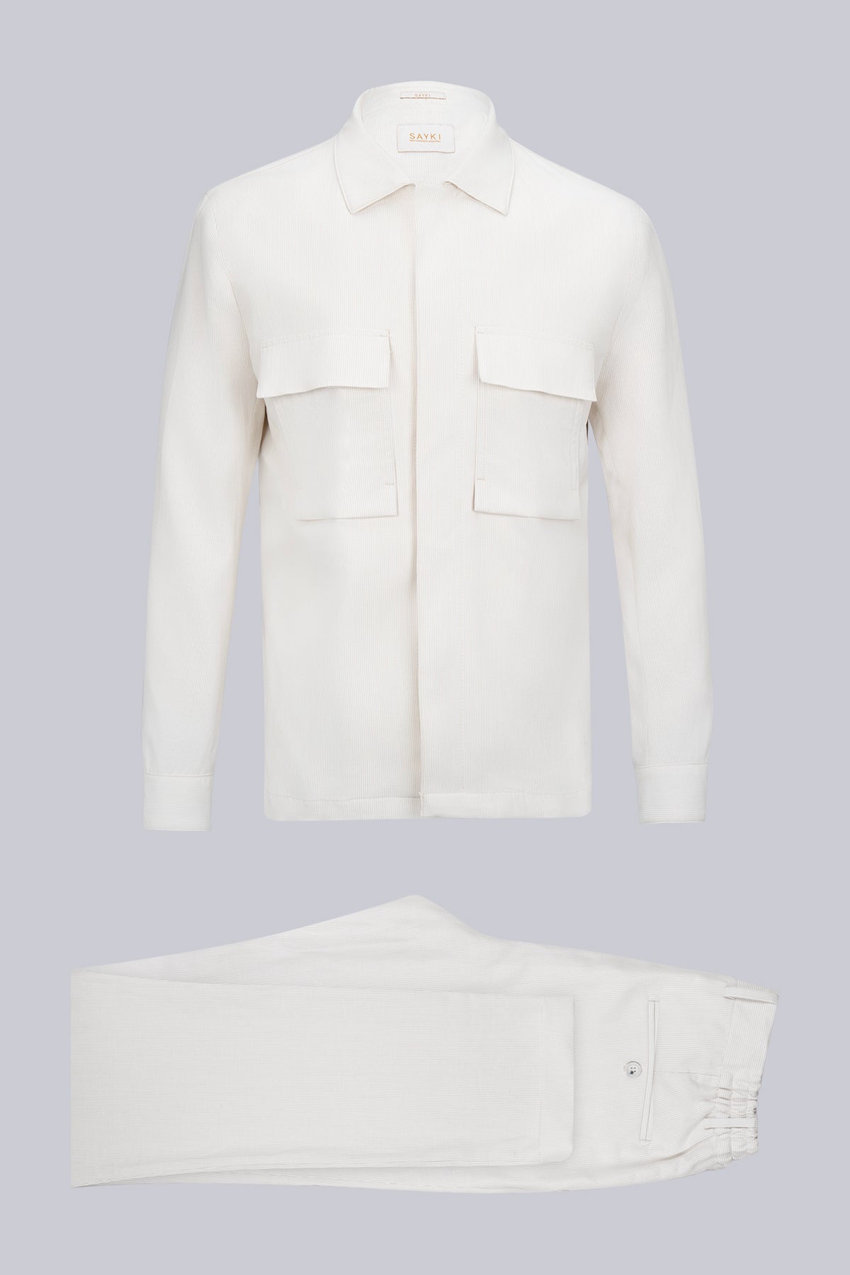White cotton shirt with two front flap pockets and a classic collar.