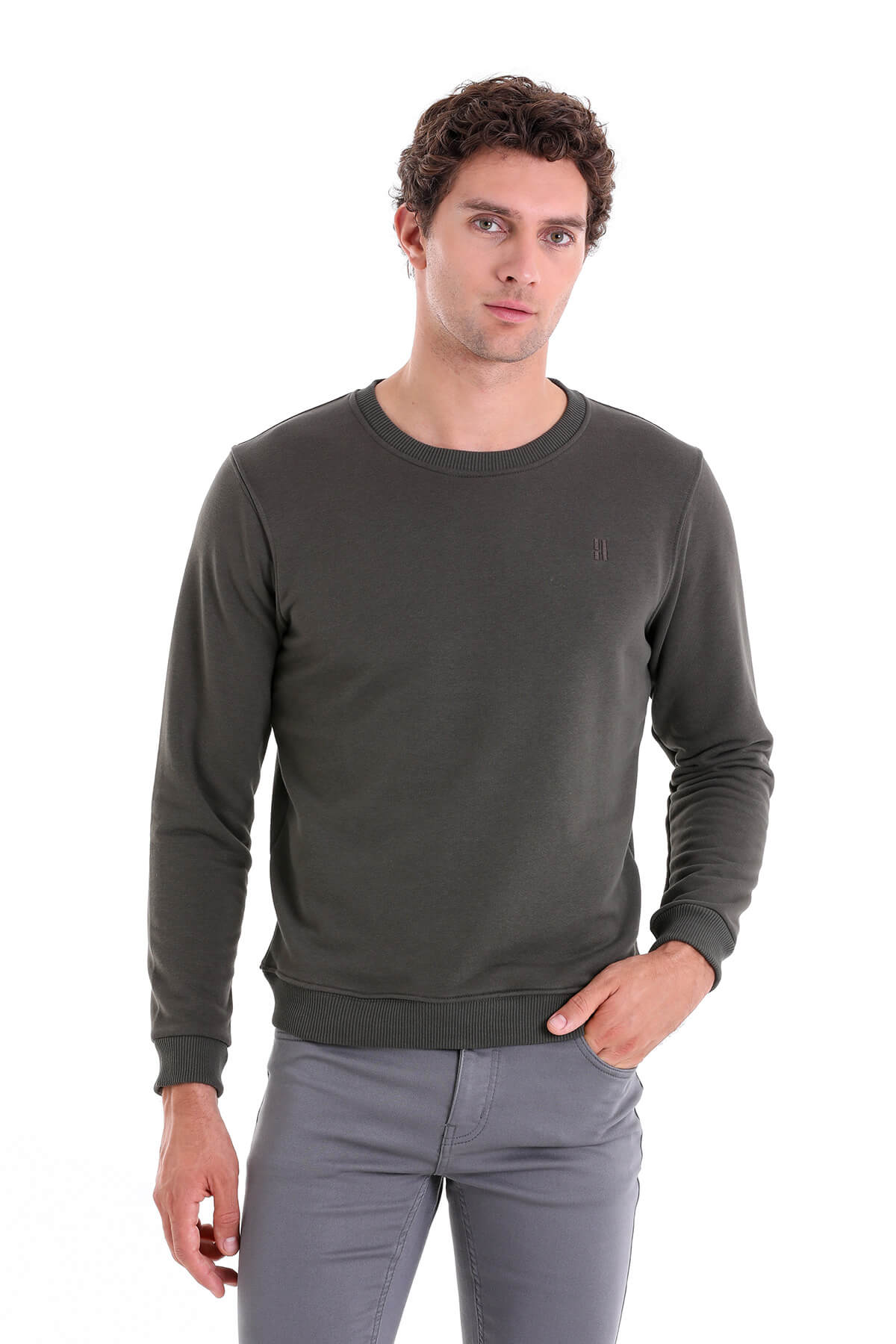 Dark olive green crewneck sweater with ribbed cuffs and hem, featuring a small embroidered logo on the left chest.