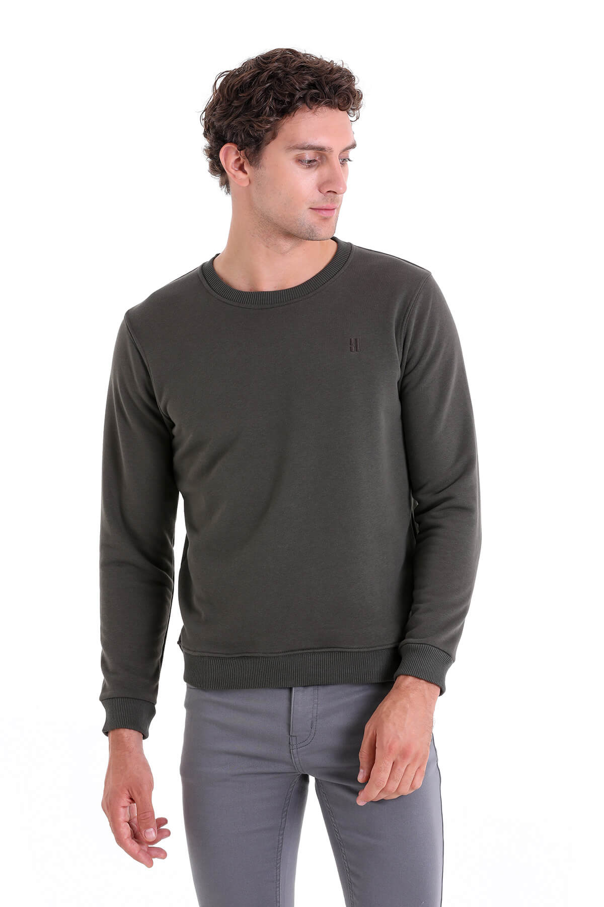 Dark olive green crewneck sweatshirt with ribbed cuffs and hem, featuring a small embroidered logo on the left chest.