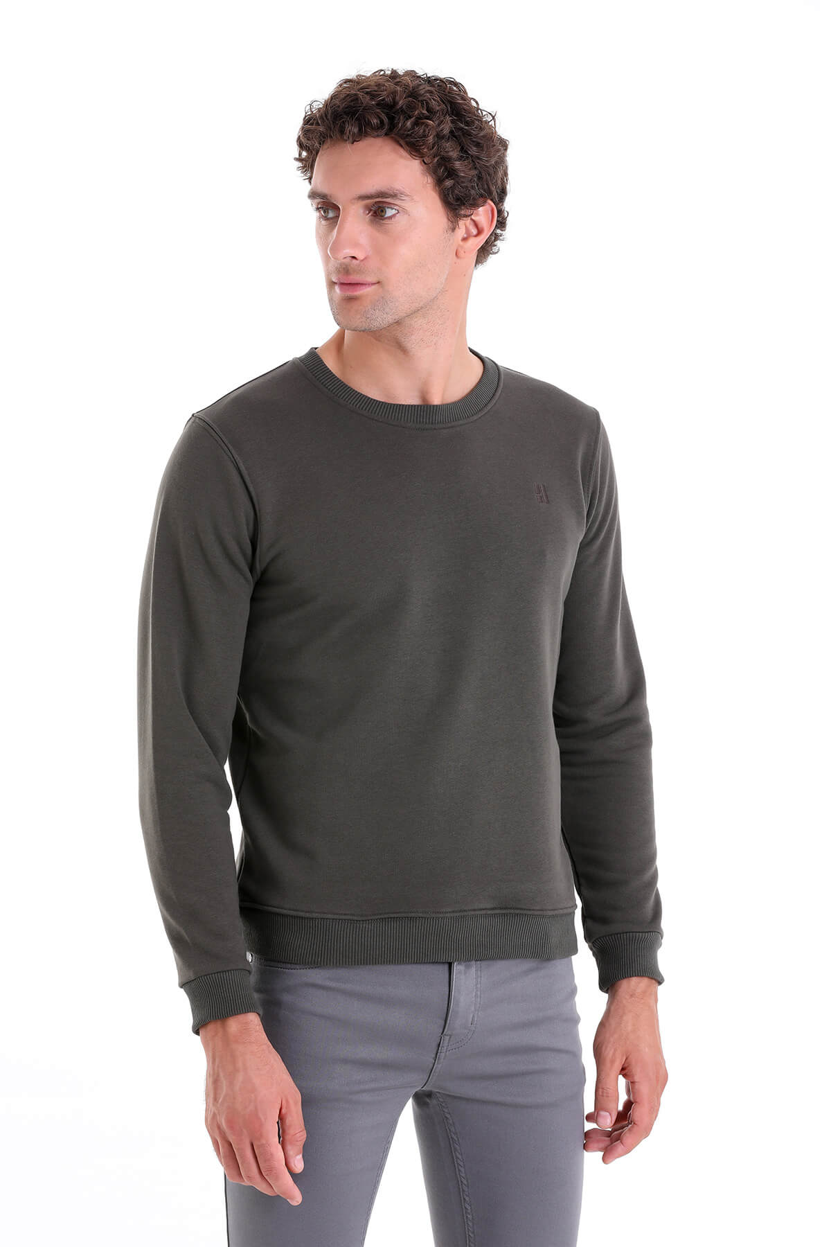 Dark olive green crewneck sweatshirt with ribbed cuffs and hem.
