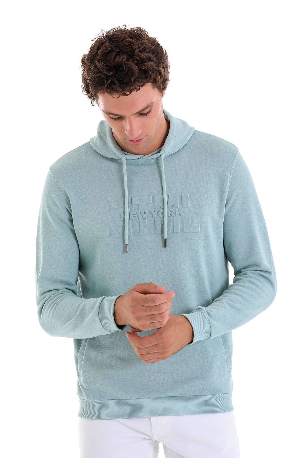 Light blue hooded sweatshirt with a subtle textured logo across the chest and matching drawstrings.