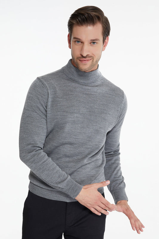 Gray turtleneck sweater with a fine knit texture and ribbed cuffs.