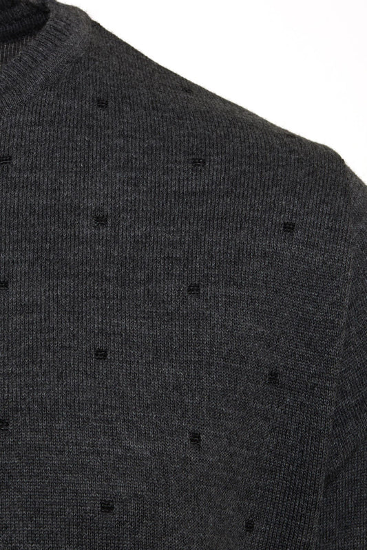 Dark gray knit sweater with subtle black geometric patterns.