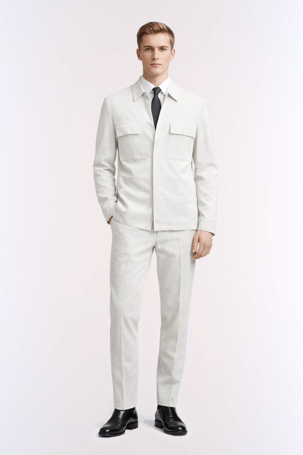 Model wearing a regular fit light gray pinstripe linen-blend casual suit with chest pockets and matching trousers
