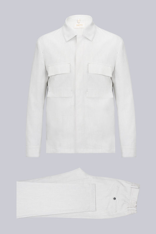 White linen shirt with two chest pockets and a classic collar.