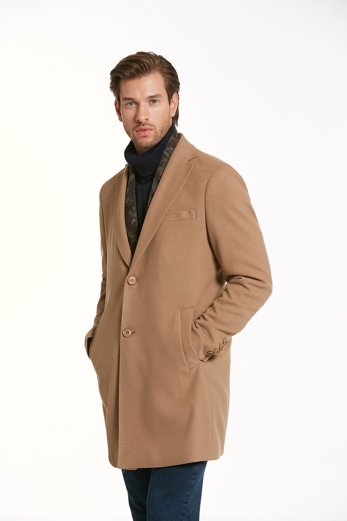 A tan wool overcoat with a classic double-breasted design and matching buttons.