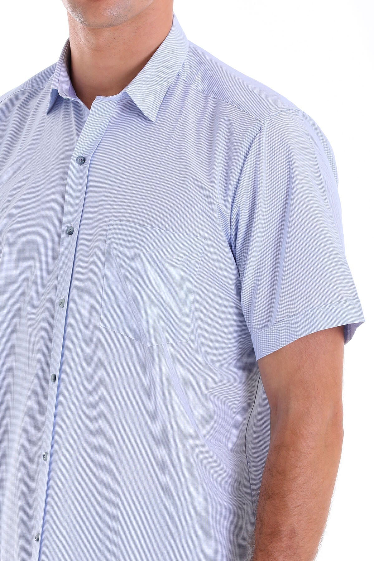 Light blue short-sleeved button-down shirt with subtle vertical pinstripes.