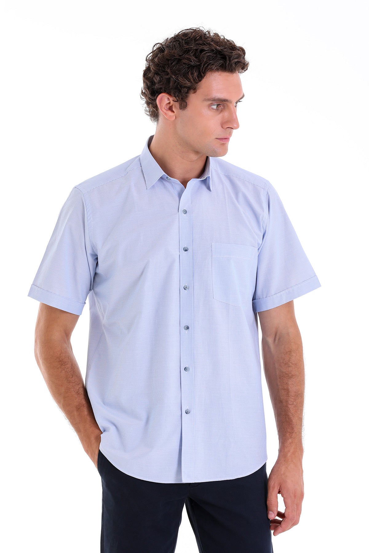 Light blue short-sleeved button-down shirt with a classic collar and chest pocket.