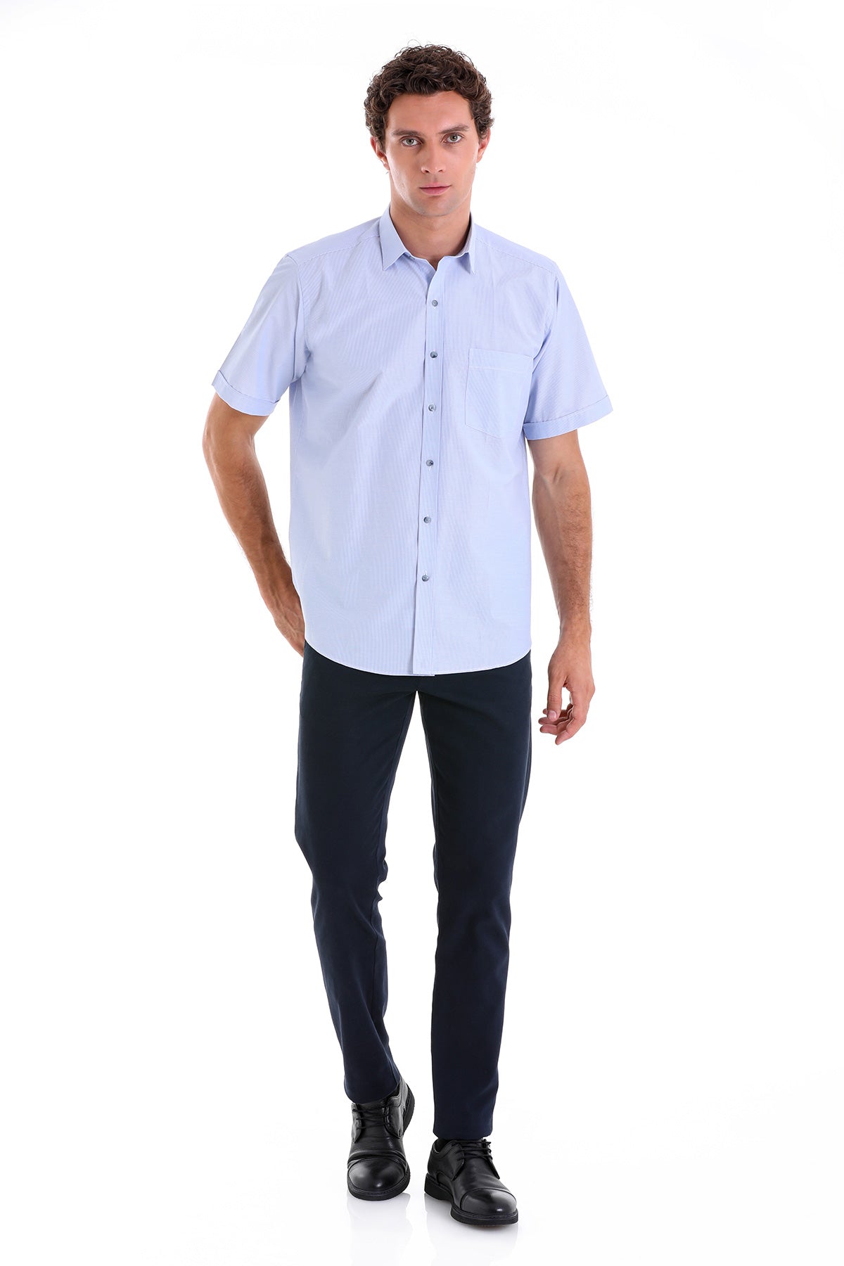 Light blue short-sleeved button-down shirt with a classic collar and chest pocket.