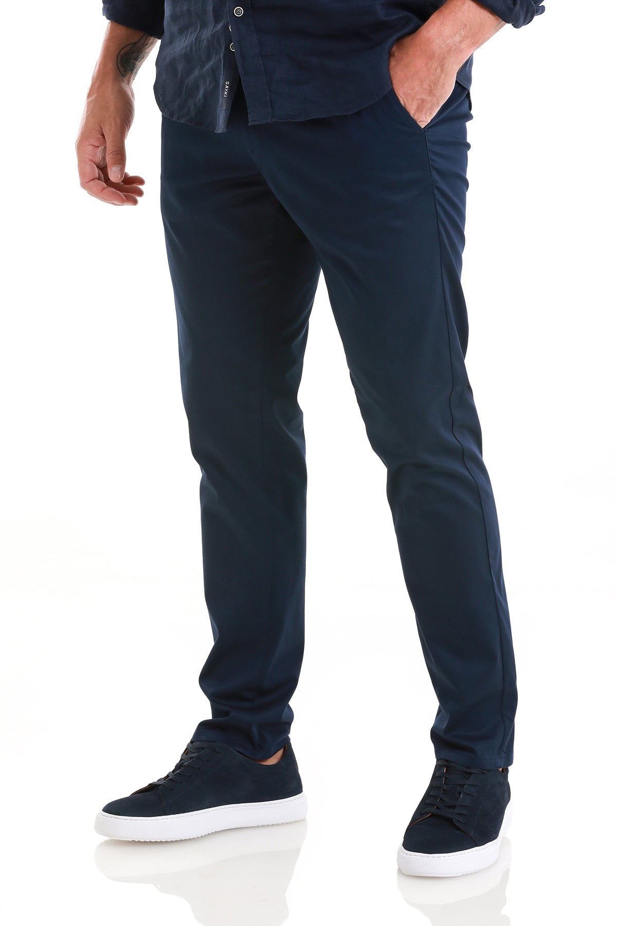 Dark navy slim-fit chinos made of a smooth, lightweight fabric with subtle side seam detailing.