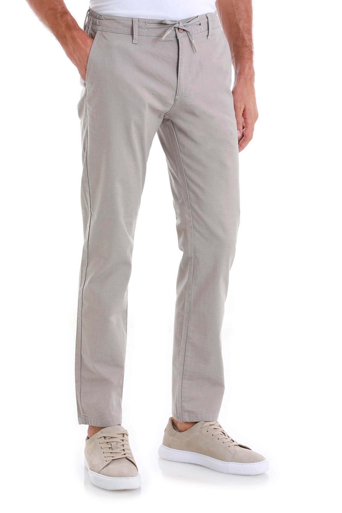 Beige chino trousers with a drawstring waistband and subtle side seam detailing.