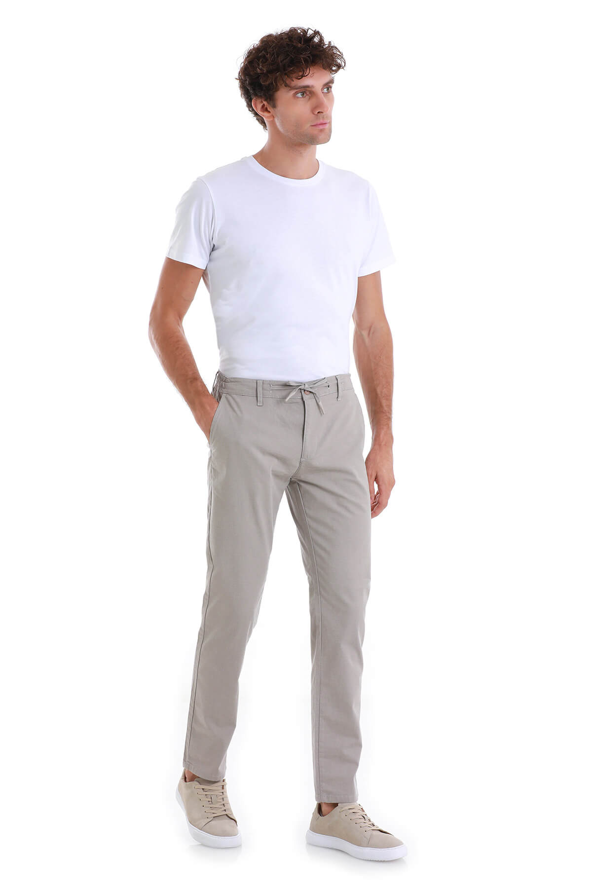Beige chino trousers with a drawstring waistband.