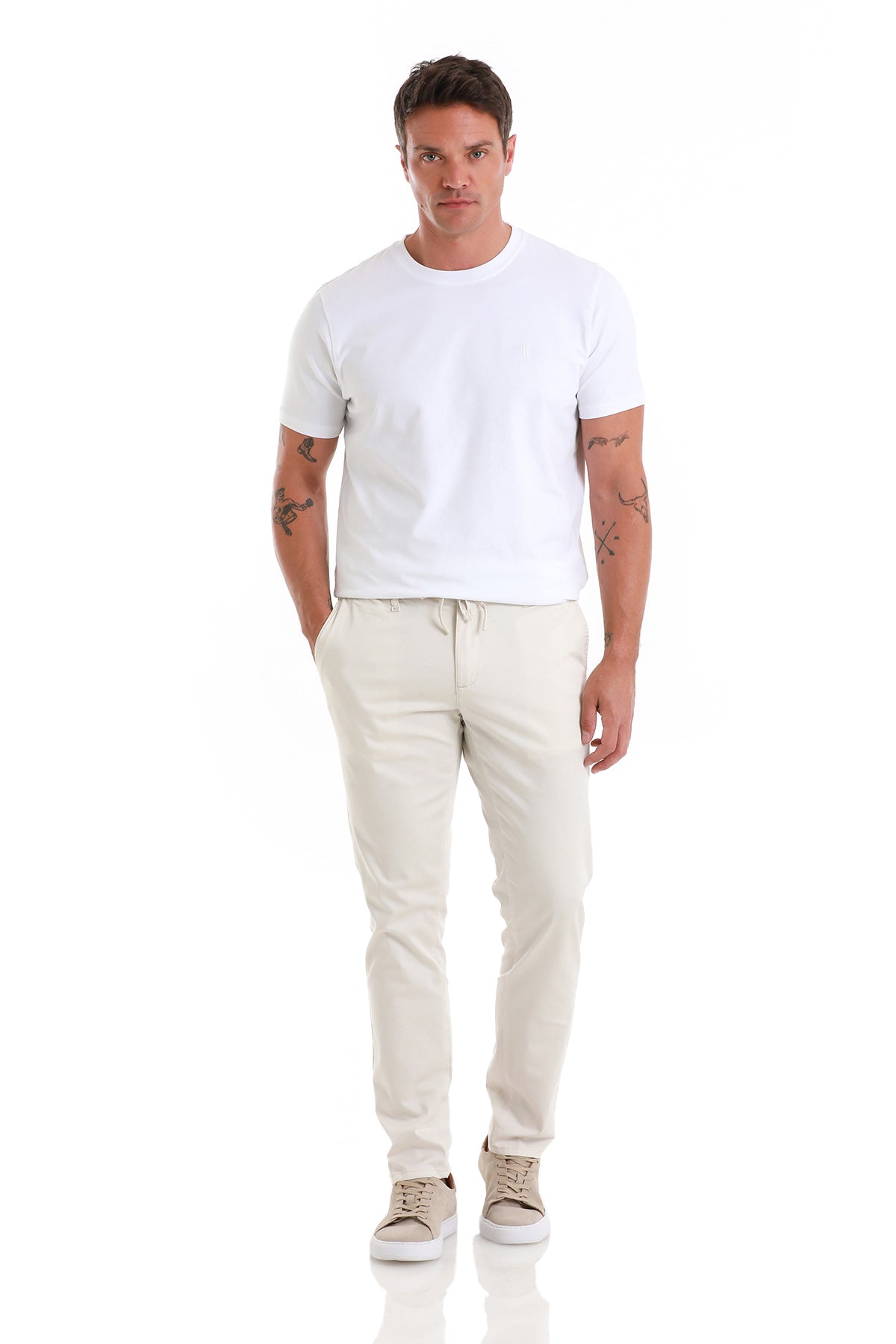 Beige chino pants with a drawstring waistband.