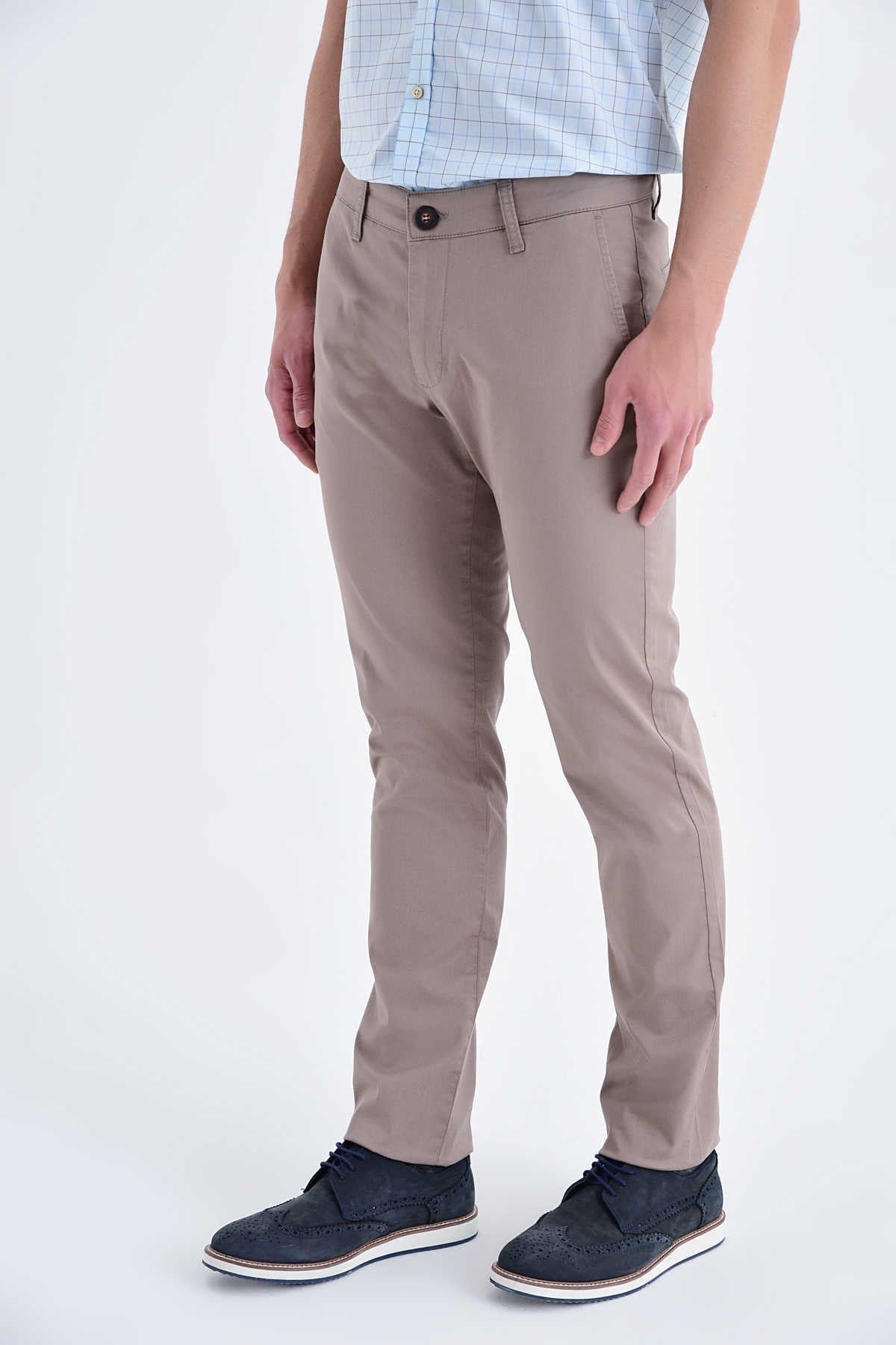 Beige chino trousers with a slim fit and subtle pleats at the waistband.