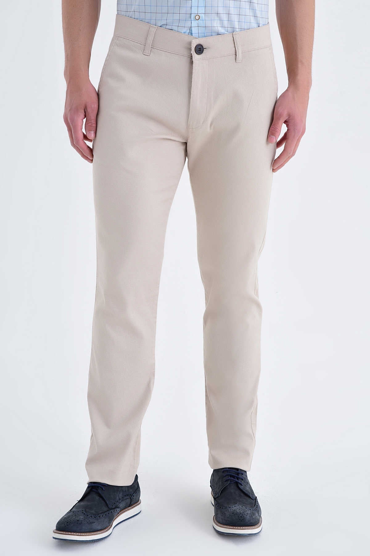 Beige chino trousers with a classic fit and subtle creases.
