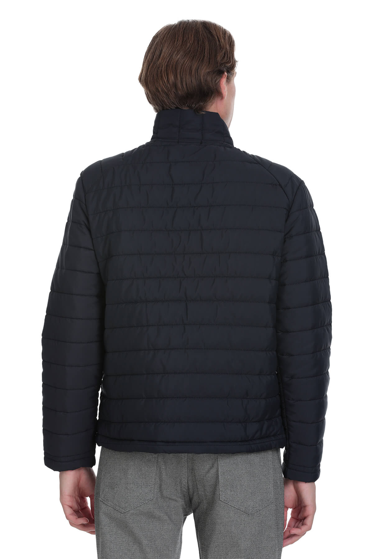 Black quilted puffer jacket with a high collar and ribbed cuffs.