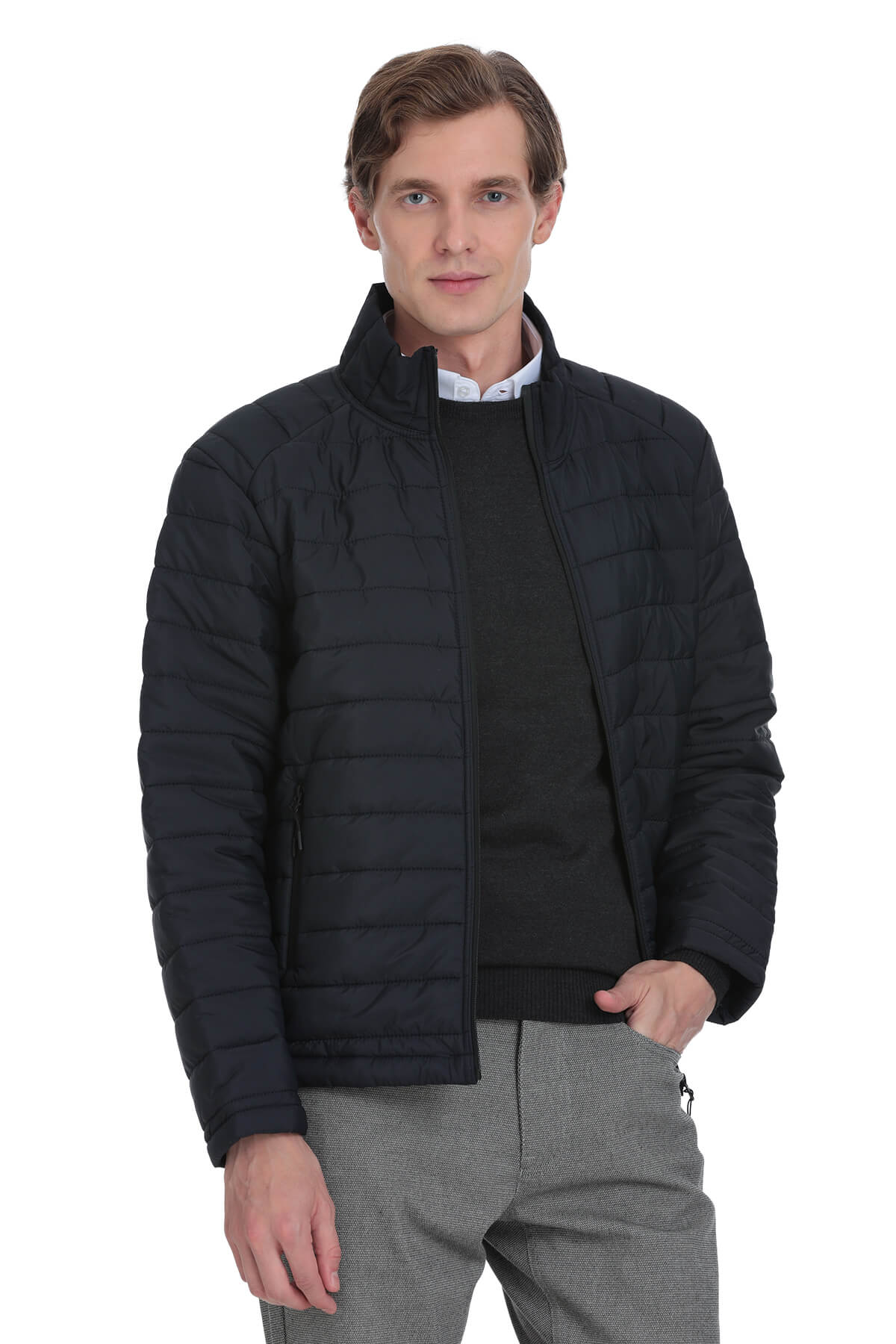 Black quilted puffer jacket with a stand-up collar and front zipper.