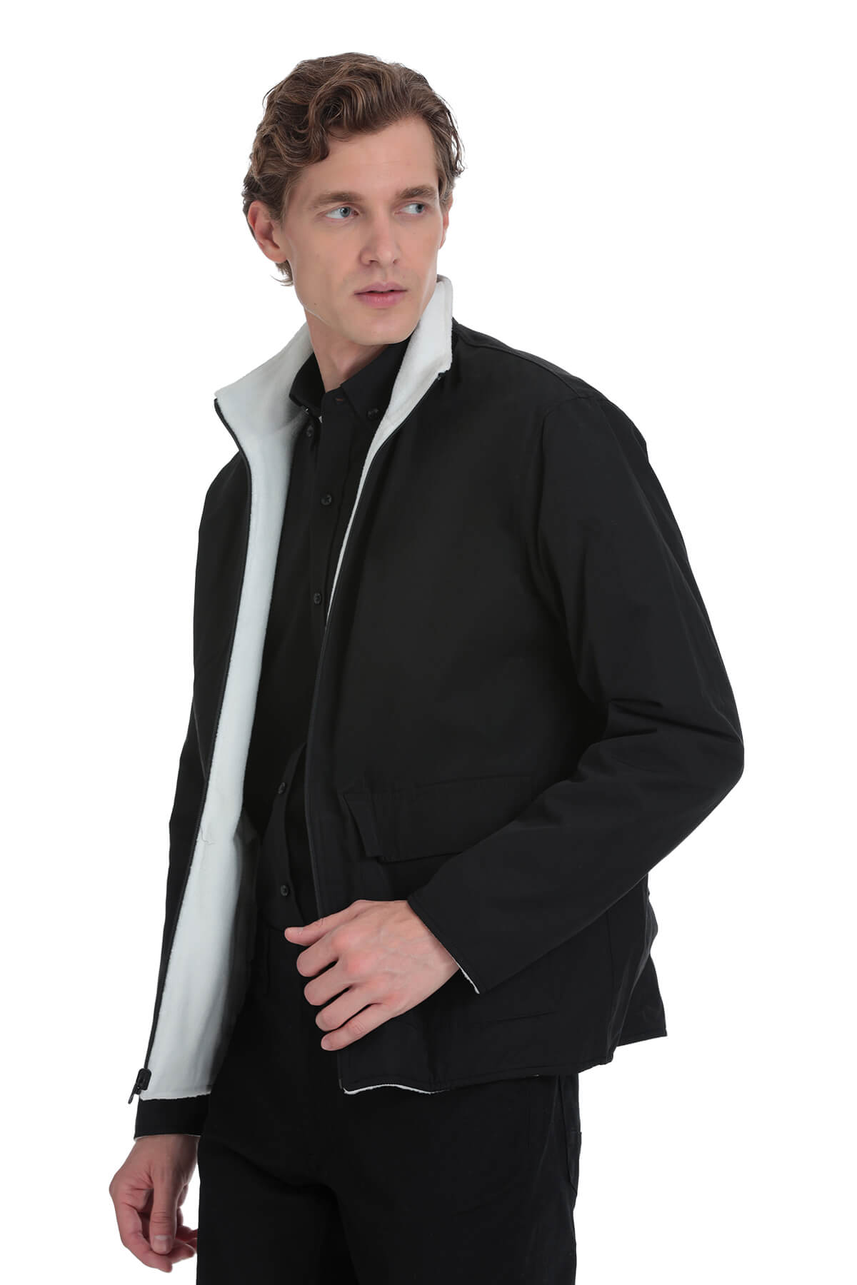 Black puffer jacket with a contrasting white fleece-lined collar and zipper trim.