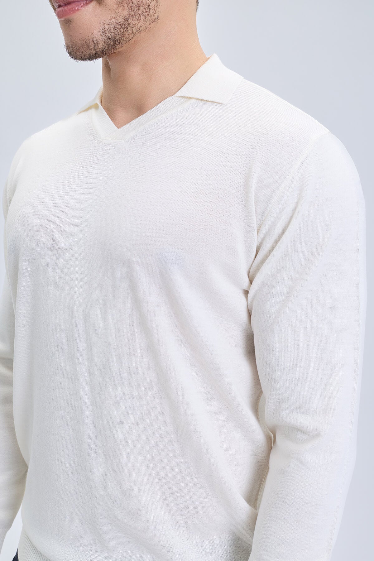 A crisp white regular fit johnny polo sweater with a subtle textured knit made from wool blend material