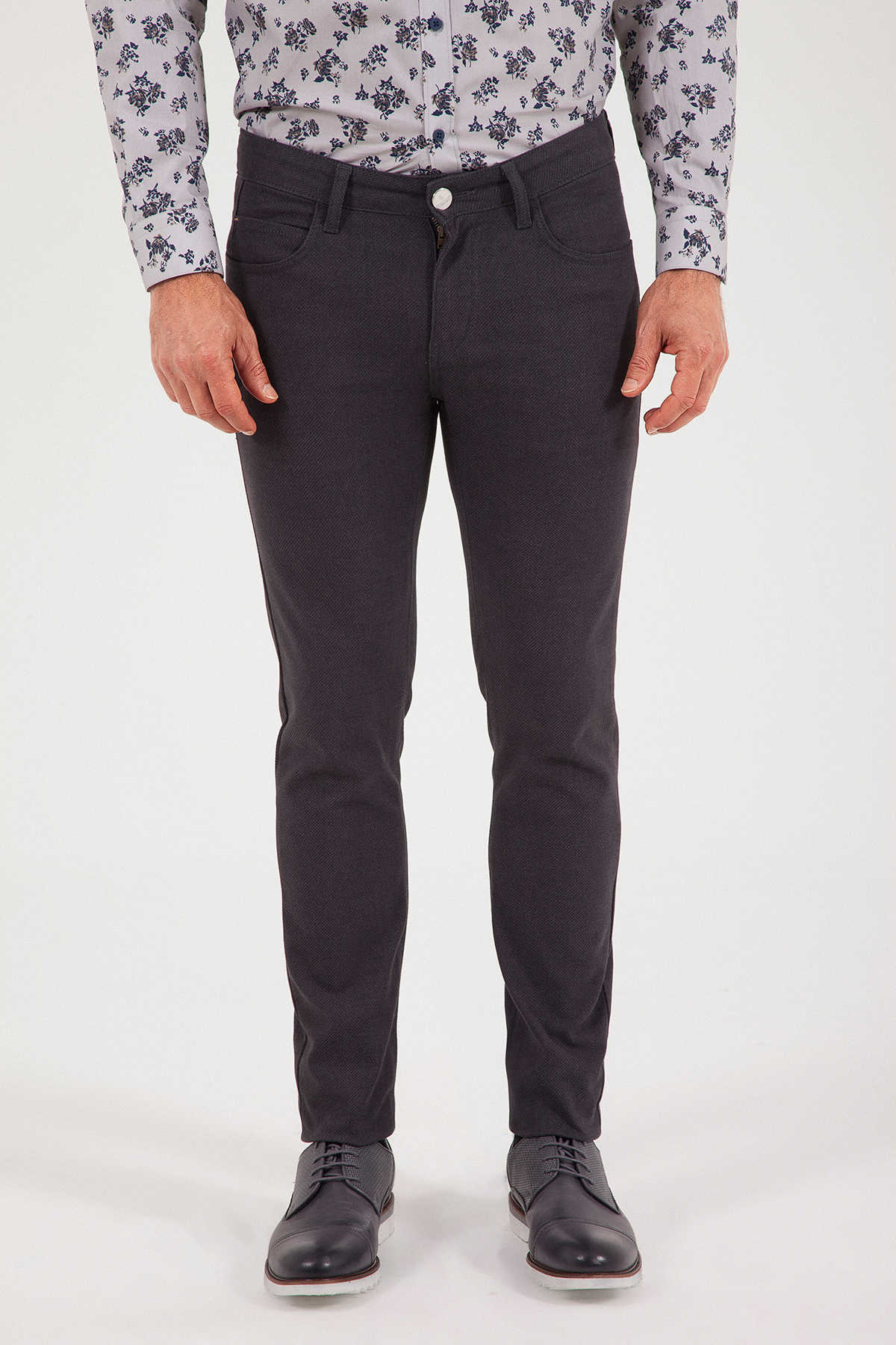 Dark gray slim-fit trousers with a subtle textured weave and classic five-pocket design.